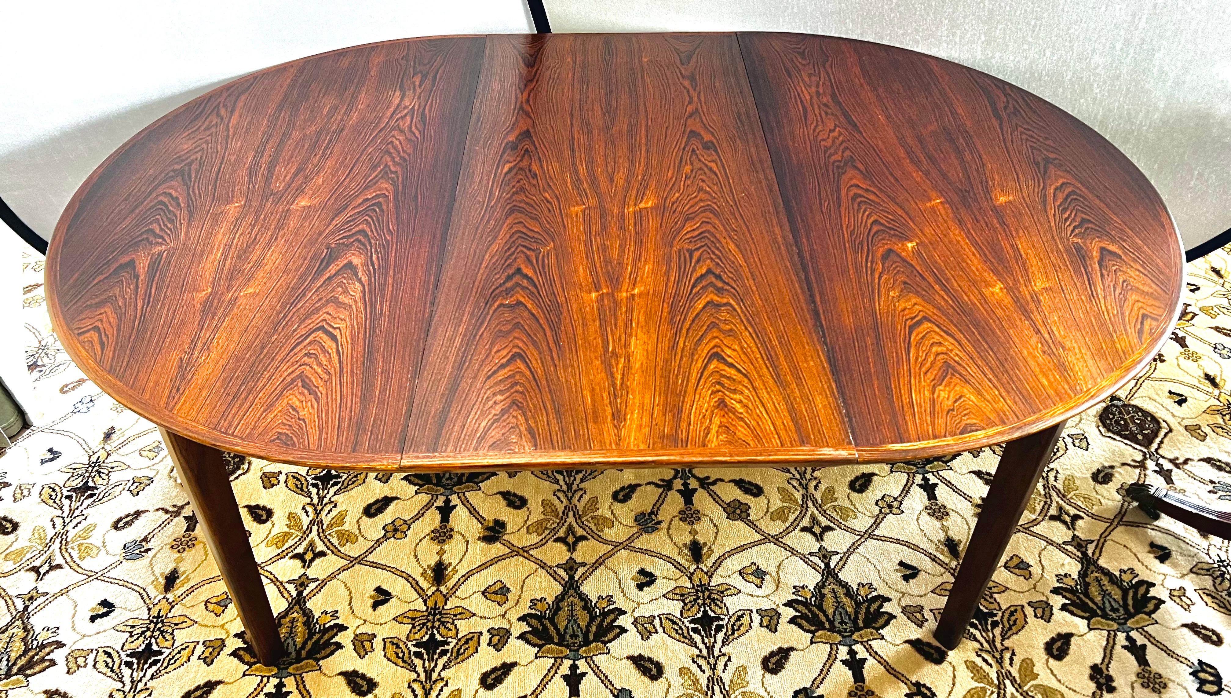 Rare Ole Hald for Gudme Mobelfabrik extendable dining table.  Without leaf, the table is round and has diameter of 44