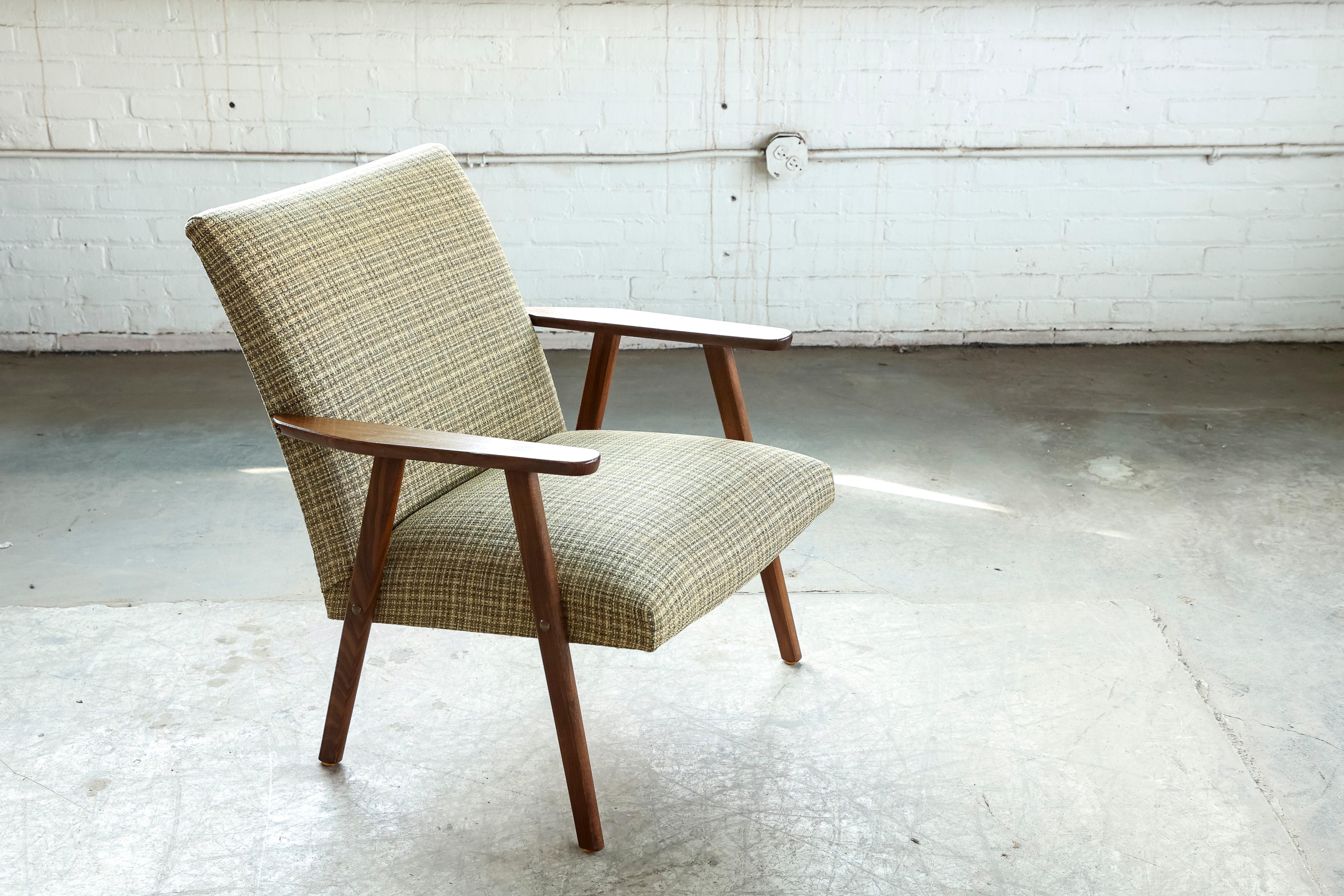 Really nice 1960s easy chair very typical for the designs of the era such as Arne Vodder and Hans Wegner. Frame is built into the seat and made from solid teak. solid and sturdy yet light versatile chair and overall in very good condition with the