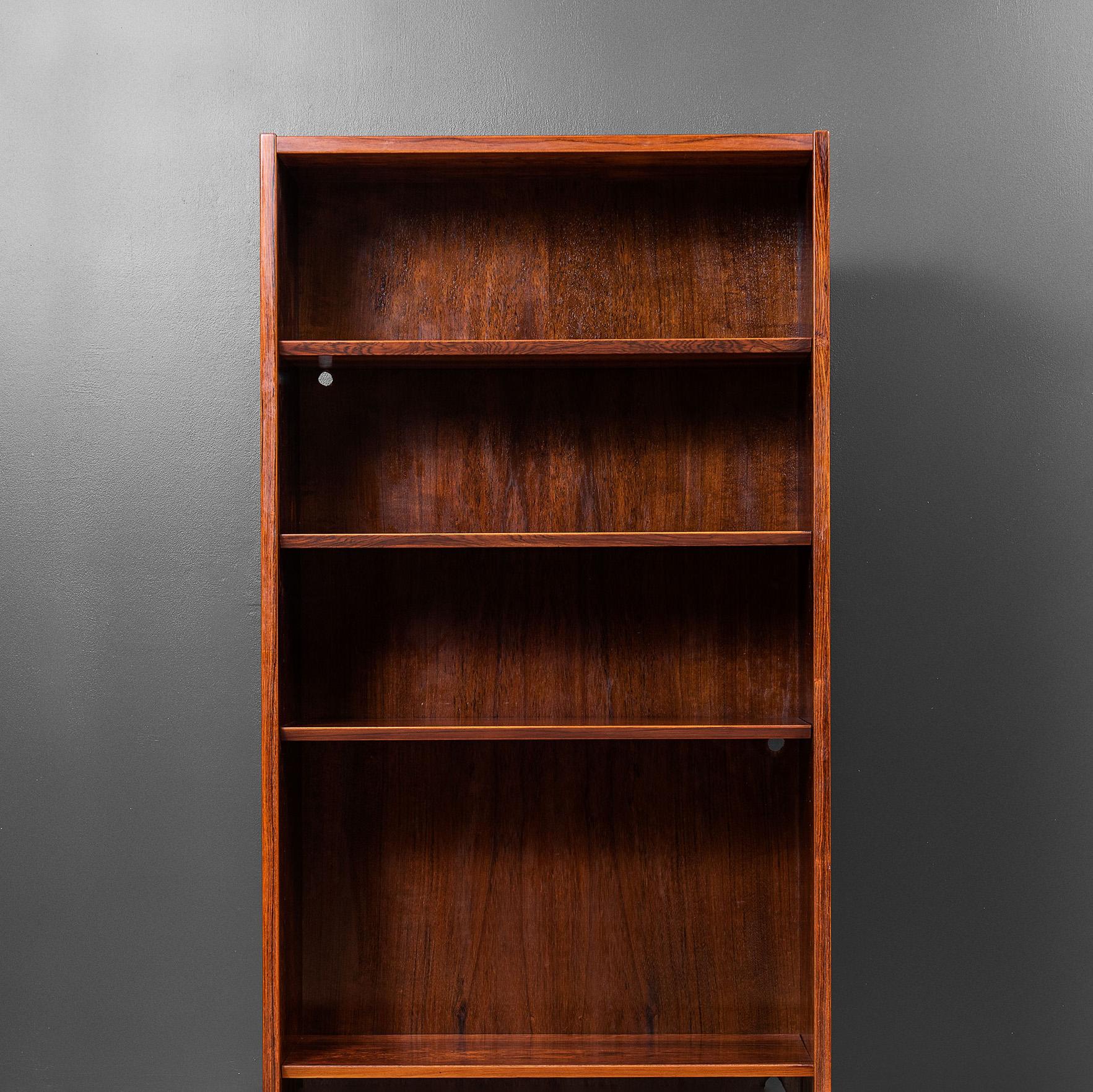 A Danish midcentury bookcase with height adjustable shelves.