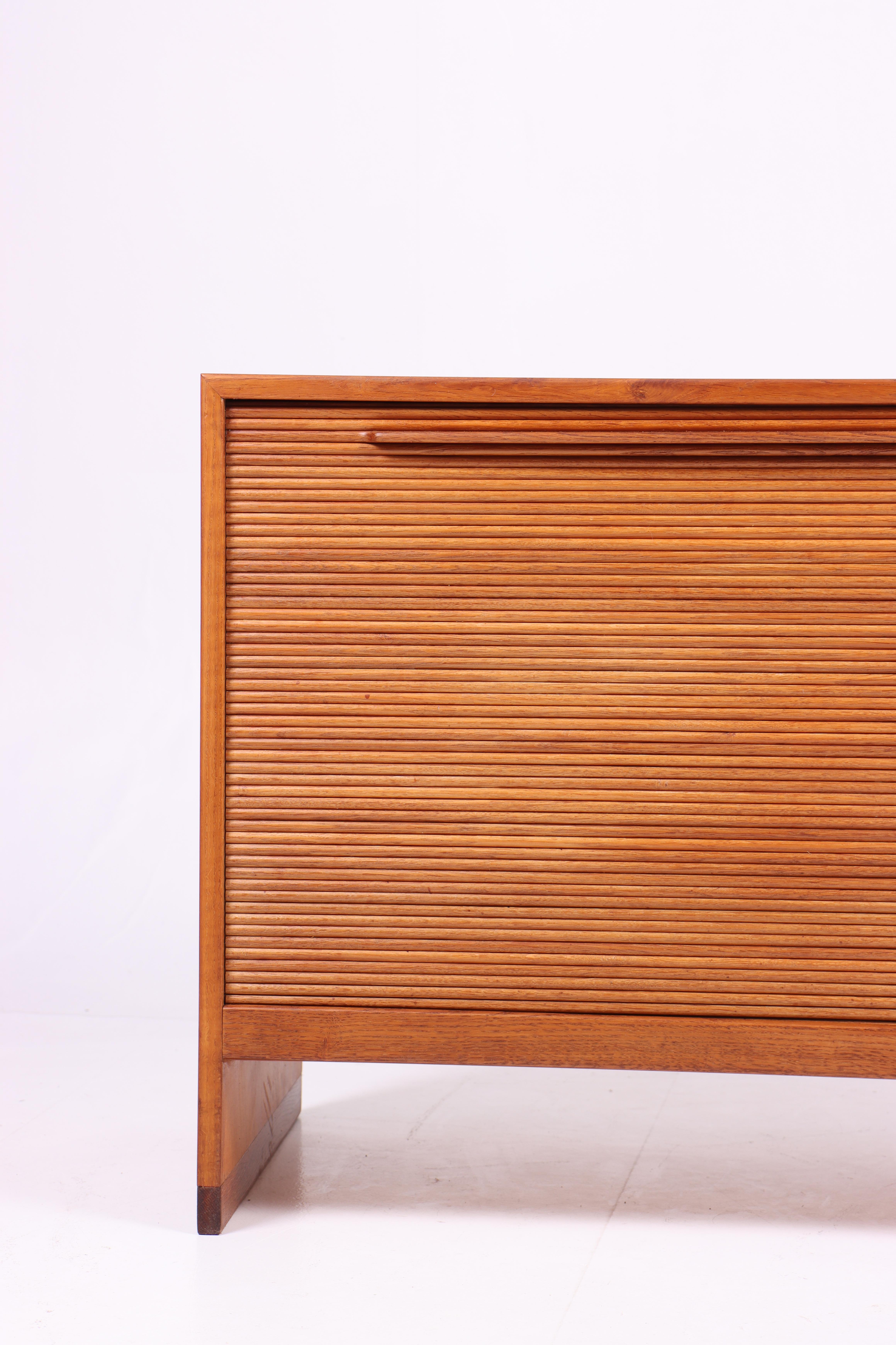 Rare cabinet in oak. Designed by Hans J Wegner for RY Moebler cabinetmakers in the late 1950s.