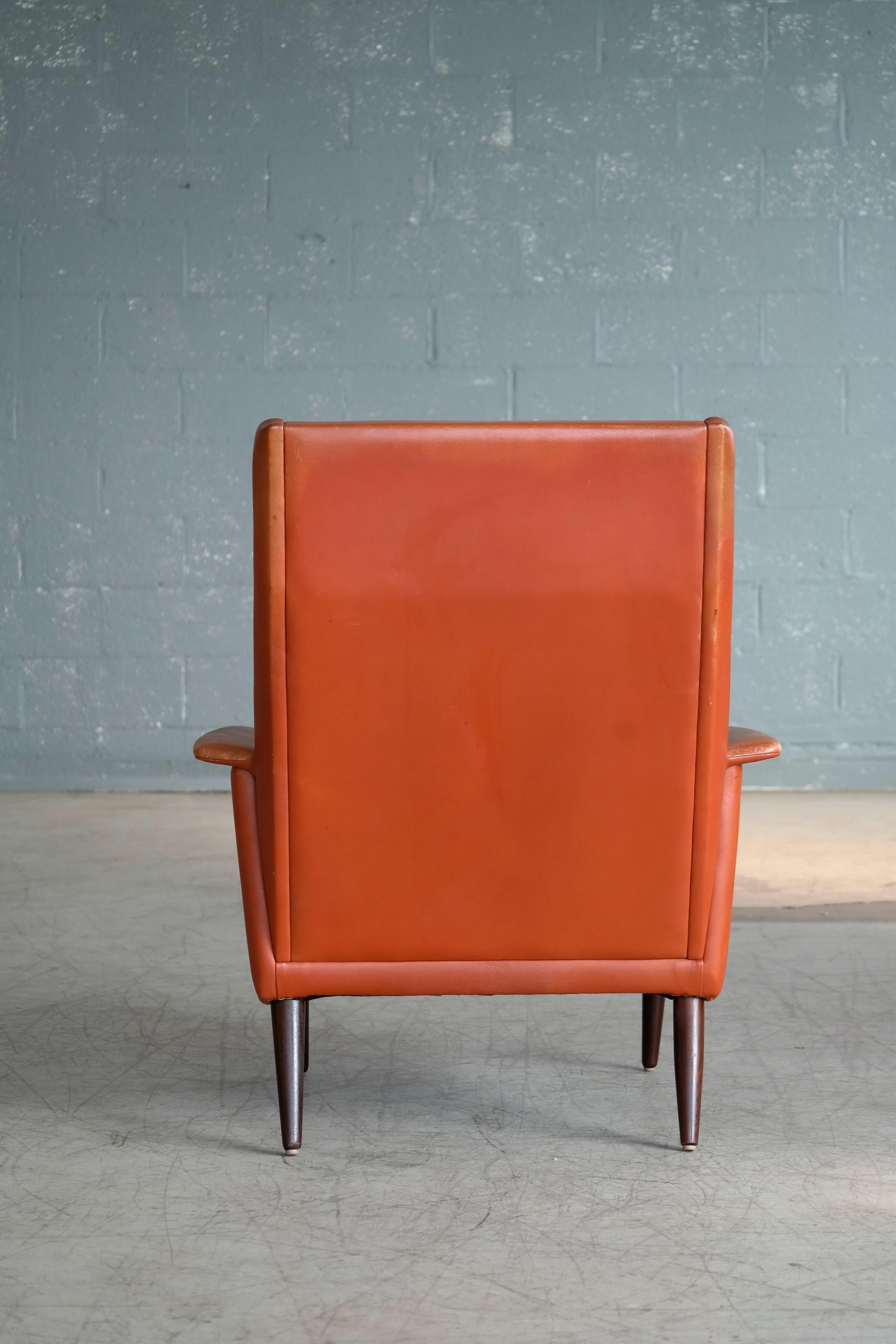 Dänischer Sessel mit hoher Rückenlehne aus der Mitte des Jahrhunderts, cognacfarben, von Sibast im Angebot 6