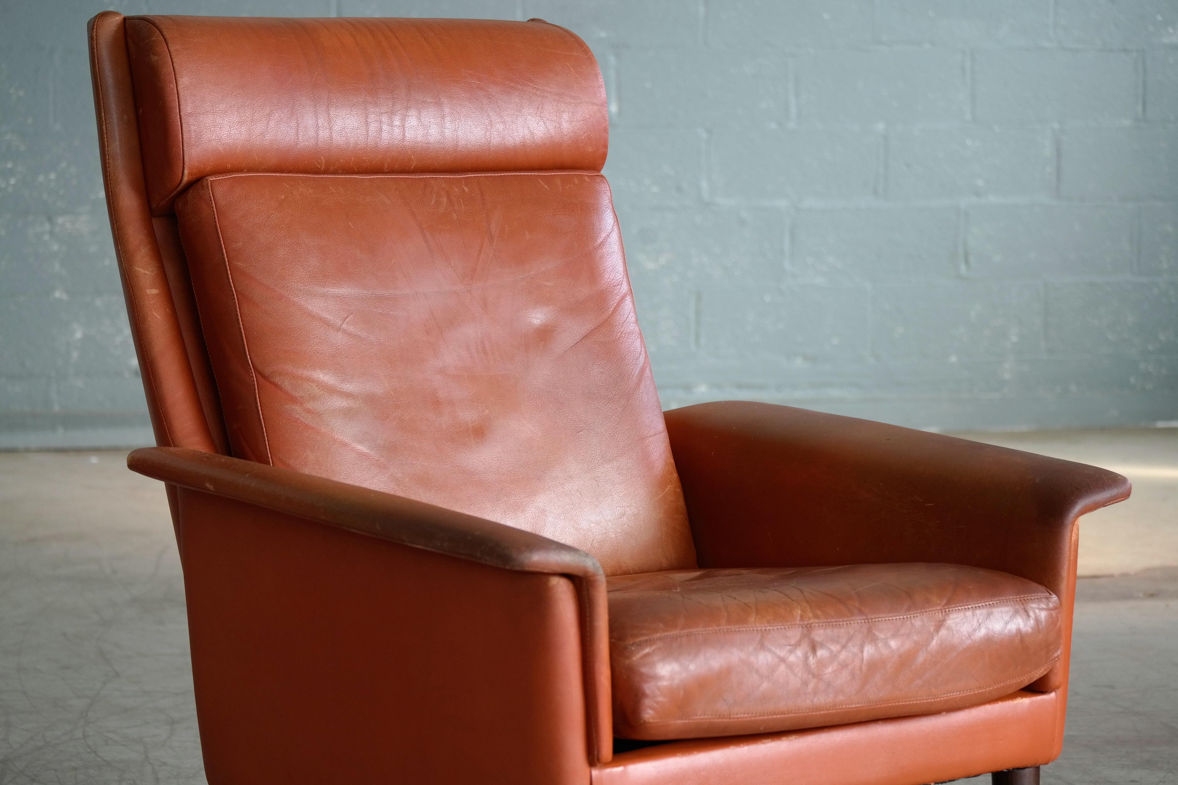 Dänischer Sessel mit hoher Rückenlehne aus der Mitte des Jahrhunderts, cognacfarben, von Sibast (Leder) im Angebot