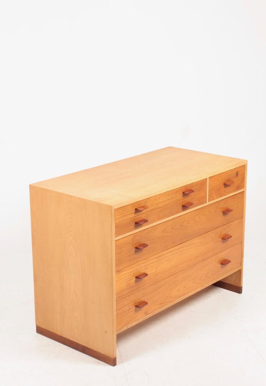 Commodes in oak with teak drawers. Designed by Hans J Wegner for RY Moebler cabinetmakers in the late 1950s.