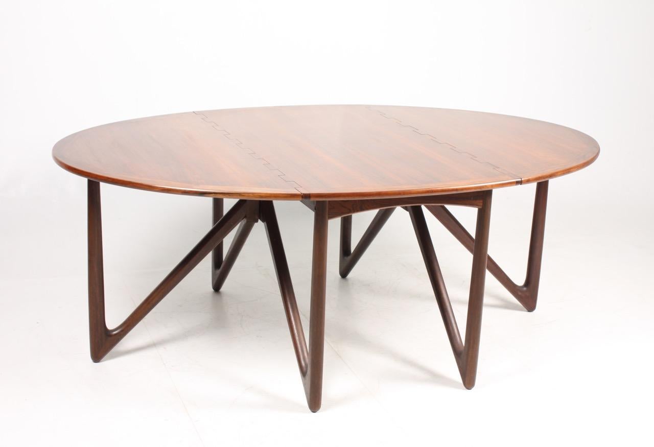Gate leg table in rosewood designed by Kurt Østervig for Jason Furniture in Denmark. Great original condition.