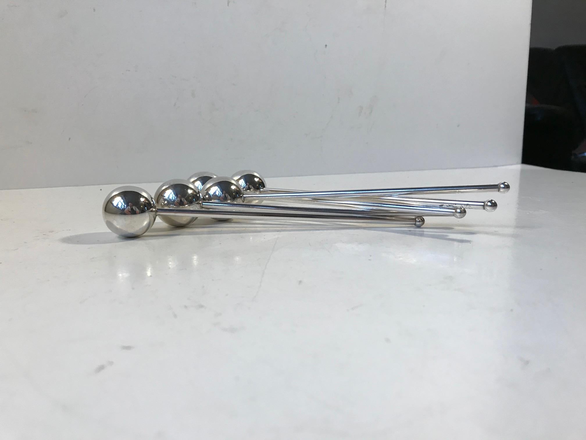 A set of 5 drink coolers or stirrers. Composed silver plated brass. Designed of manufactured by ABSA in Denmark in a style reminiscent of Piet Hein.