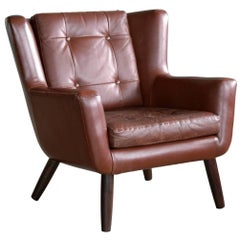 Danish Midcentury Easy Chair in Leather and Teak by Skjold Sørensen