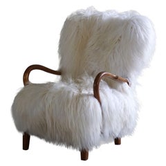Danish Midcentury Easy Chair in Oak 
Icelandic Sheepskin, Fritz Hansen, 1930s