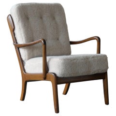 Fauteuil de détente danois du milieu du siècle dernier en laine d'agneau fabriqué par Edmund Jorgensen