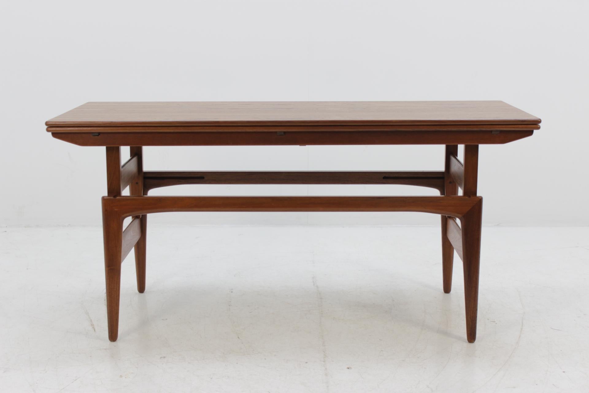 This space saving piece can be raised and also used as a small dining table. Can be raised to 75 cm and expand to 90 cm. This item was carefully restored.