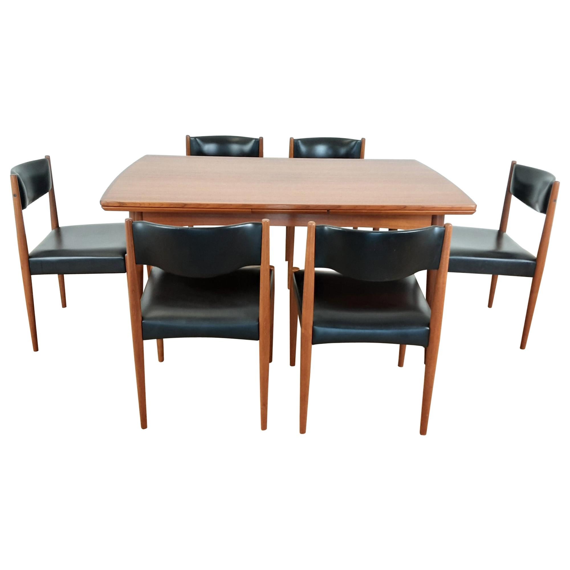 Danish Midcentury Golden Teak Extendable Dining Table and Six Chairs For Sale