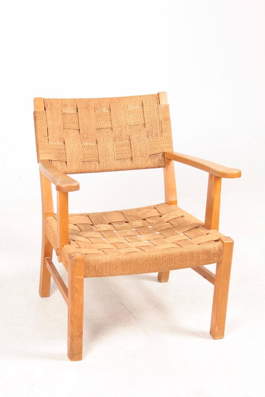 Mid-20th Century Danish Midcentury Lounge Chair in Patinatd Beech and Cane, 1950s