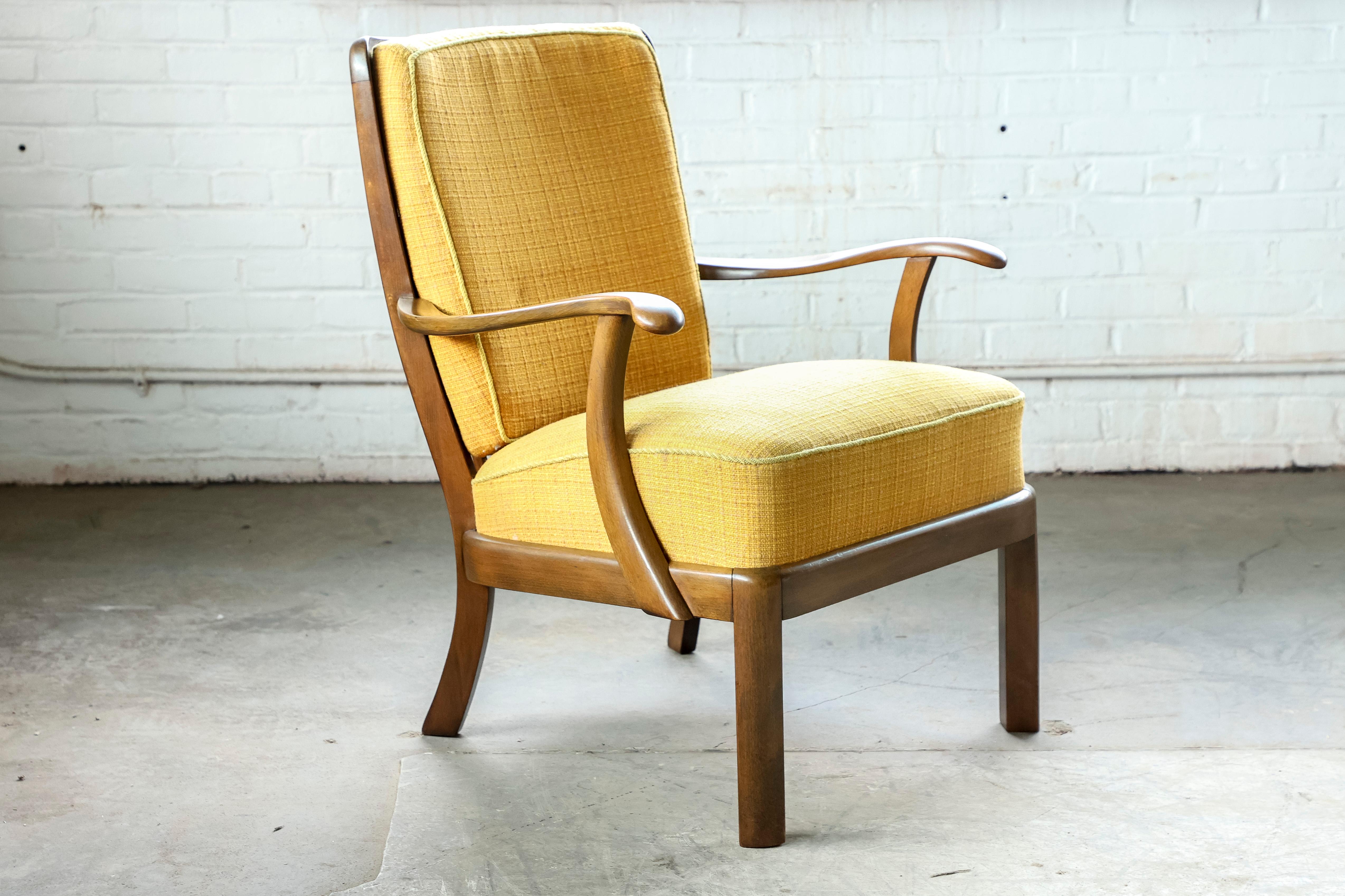 Beautiful high quality easy chair, circa late 1940's likely made by Master Carpenter, Edmund Jorgensen of Denmark. The chair is very much in his style although it is not marked and we are not sure of the maker and designer. Very elegant with the
