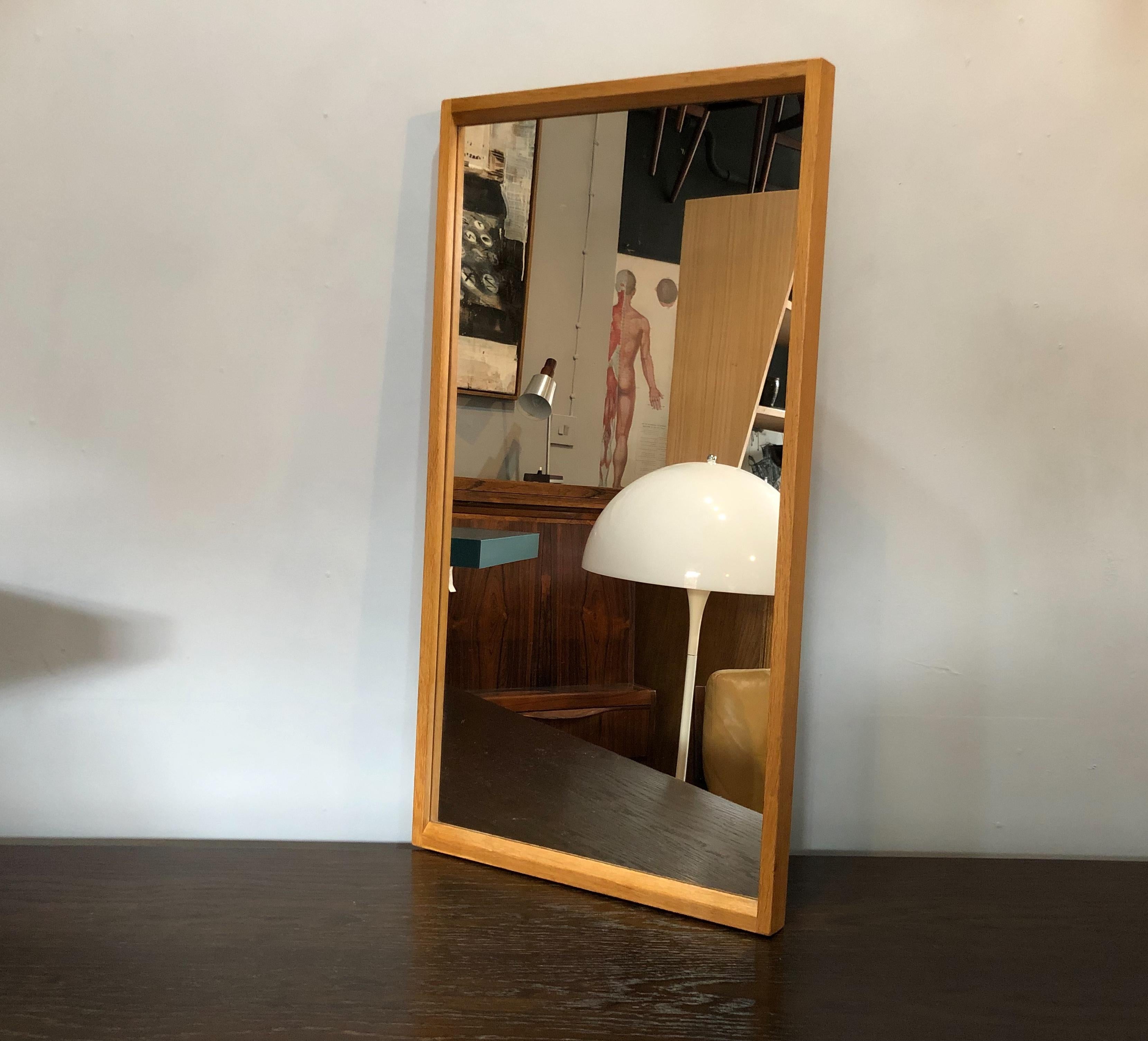 Typically stylish design from Aksel Kjersgaard. Wonderful hardwood frame. In excellent condition.
Produced by Odder, Denmark, circa 1960. Floor standing or wall mountable.