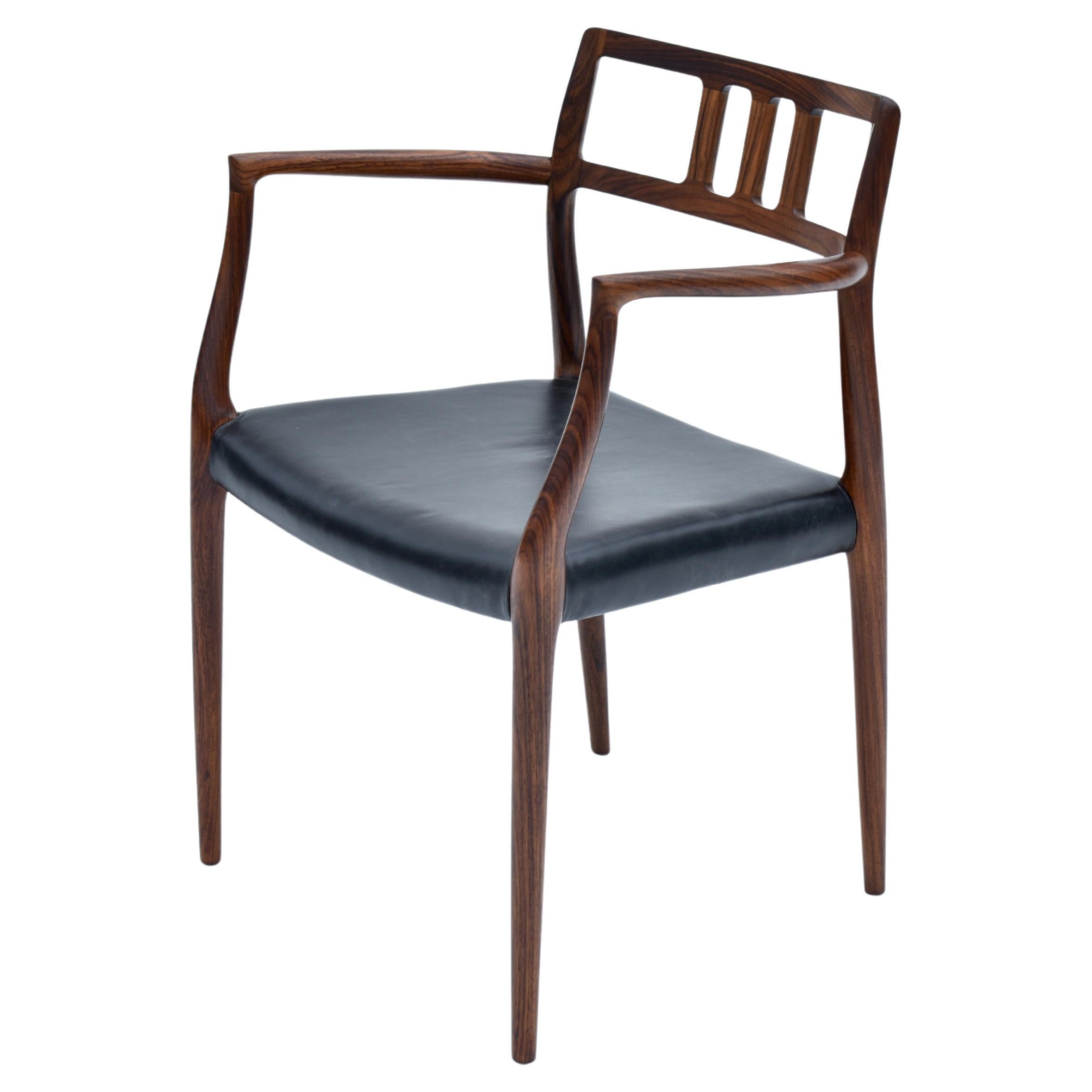 Fauteuil danois du milieu du siècle Niels Møller Modèle 64 en bois de rose, 1966