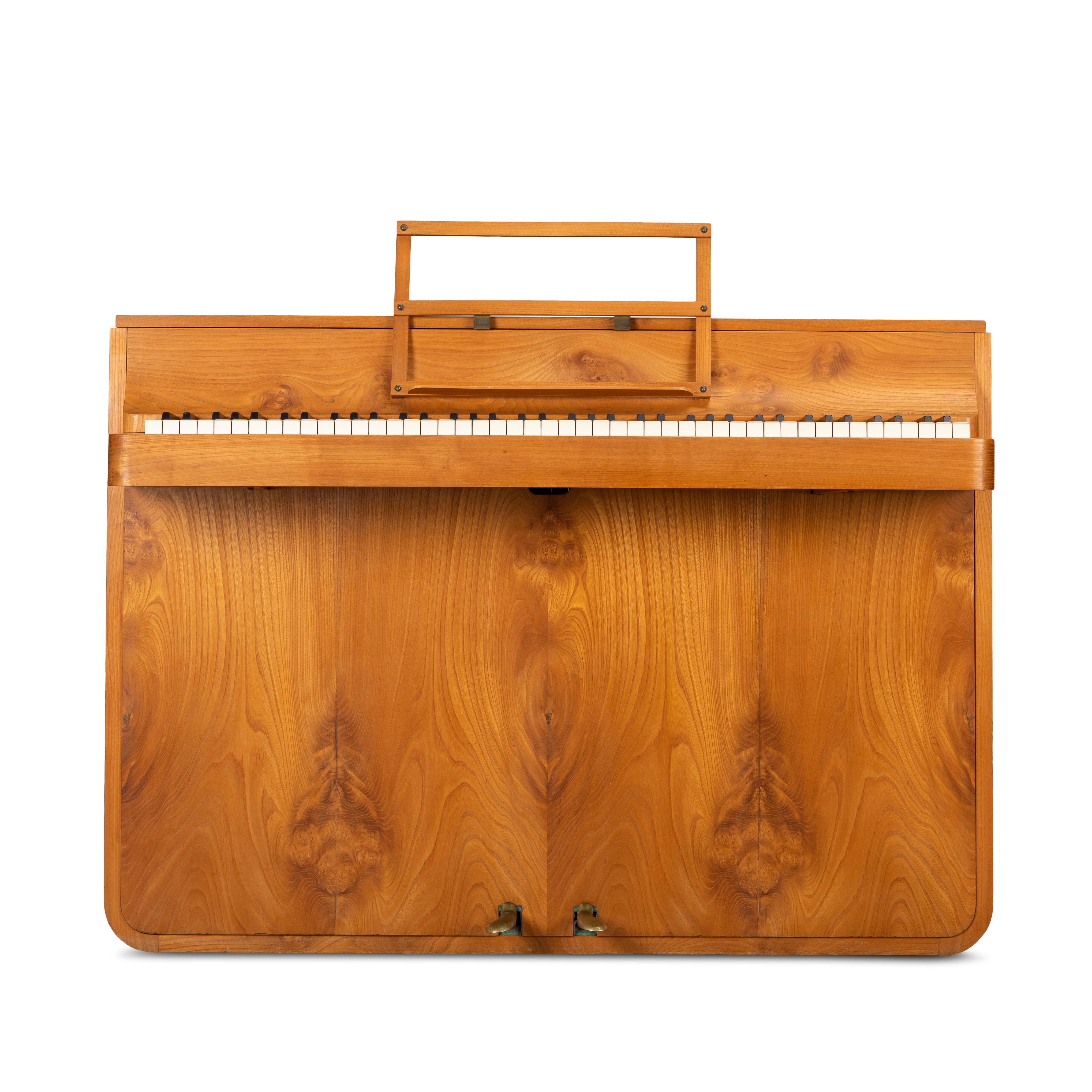 A rare Danish midcentury pianette made of magnificent oak. It is called pianette due to the 82 keys rather than the standard 88 of a full size piano. This pianette is made by renowned piano maker Louis Zwicki. This piece stands out in a modern