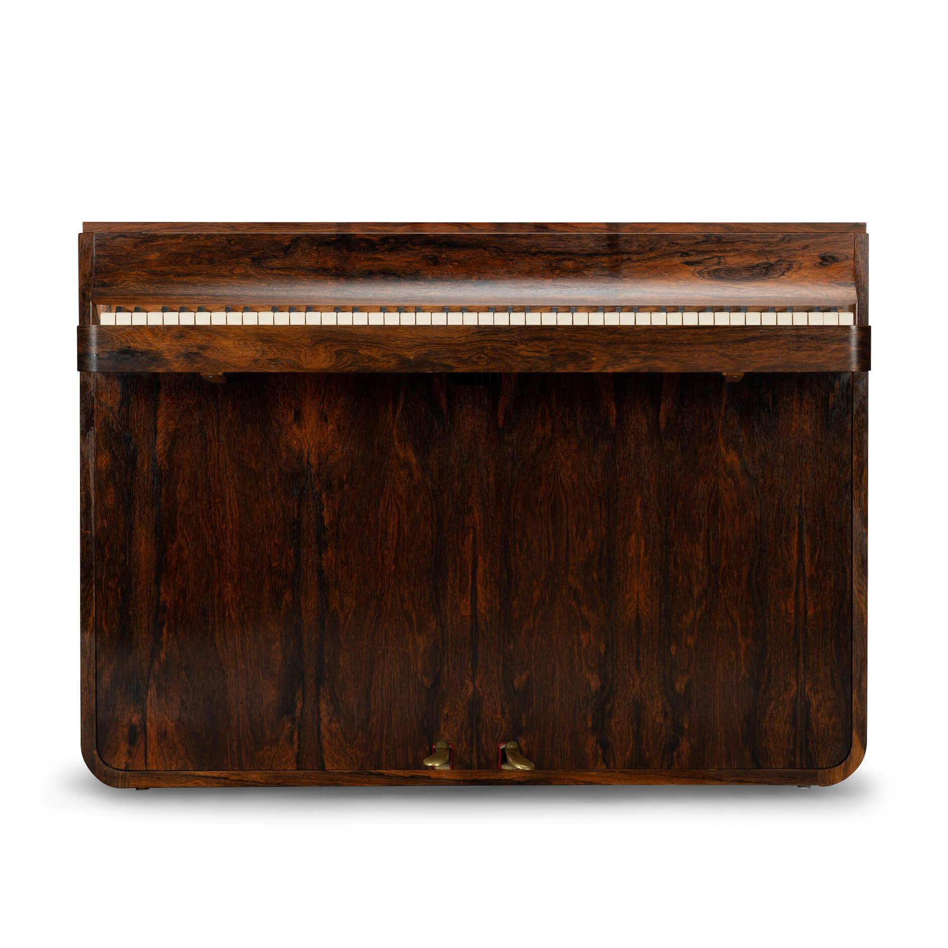 Danish design
A rare Danish midcentury pianette made of magnificent rosewood. It is called pianette due to the 82 keys rather than the standard 88 of a full size piano. This pianette is made by renowned piano maker Louis Zwicki. Every piano from