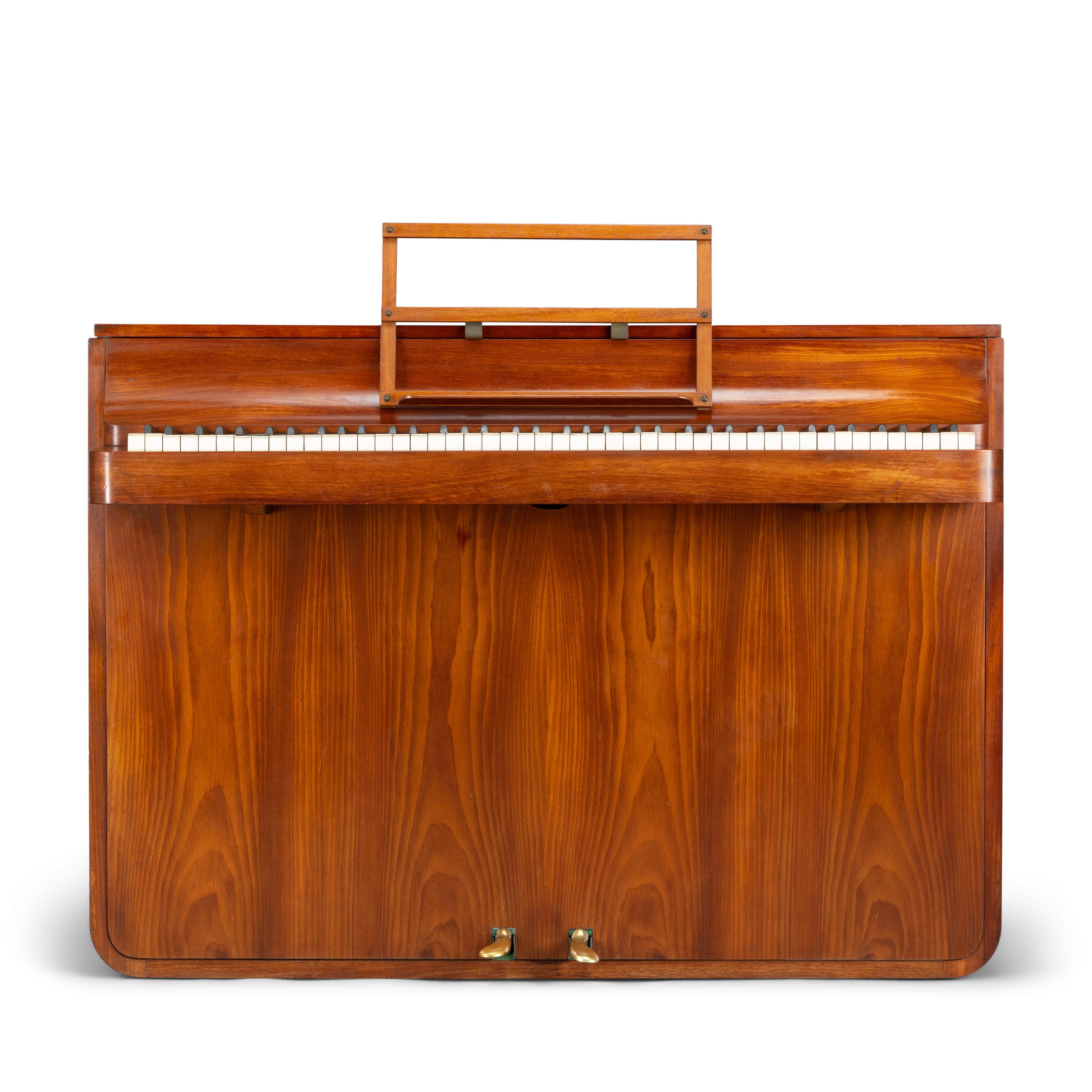 A rare Danish midcentury pianette made of magnificent teak with shellac coating. It is called pianette due to the 82 keys rather than the standard 88 of a full size piano. This pianette is made by renowned piano maker Louis Zwicki. Every piano from