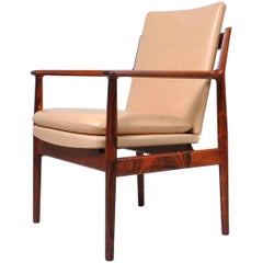 Fauteuil danois du milieu du siècle en bois de rose par Arne Vodder