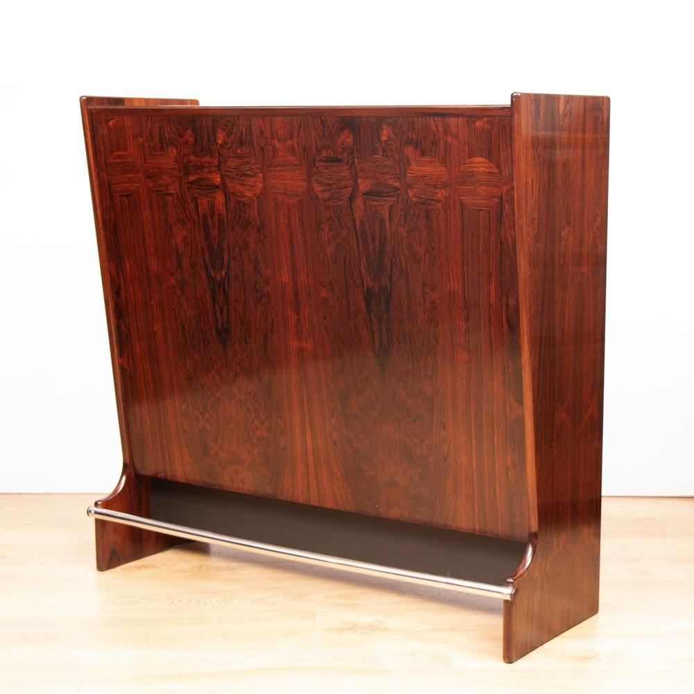 Danish midcentury rosewood bar by J Skaaning & Son & Brdr. Andersen, circa 1960.
 Rosewood bar cabinet model SK661 designed by Johannes Andersen
- Manufactured by J. Skaaning & Son & Brdr. Andersen in Denmark 1960s
- Beautiful round decors in the