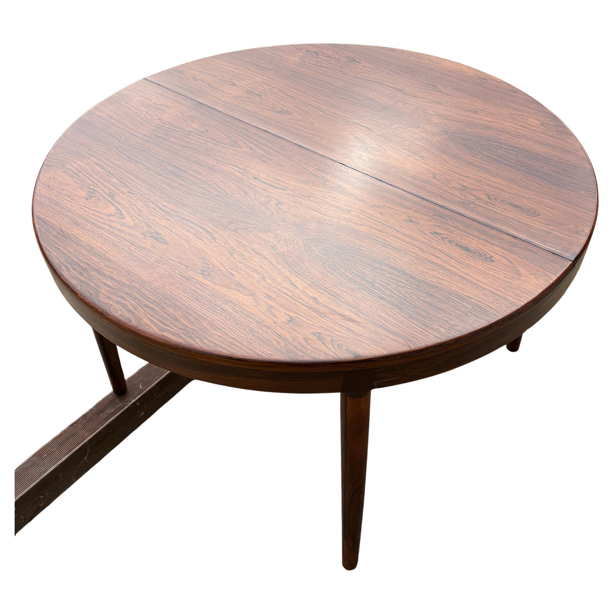 This round dining table made by Randersmobelfabrik had suffered some water damage. But we have restored it  as best possible. There are still areas of damage as shown in the pictures. However, the table was too good to give up on so we relacquered