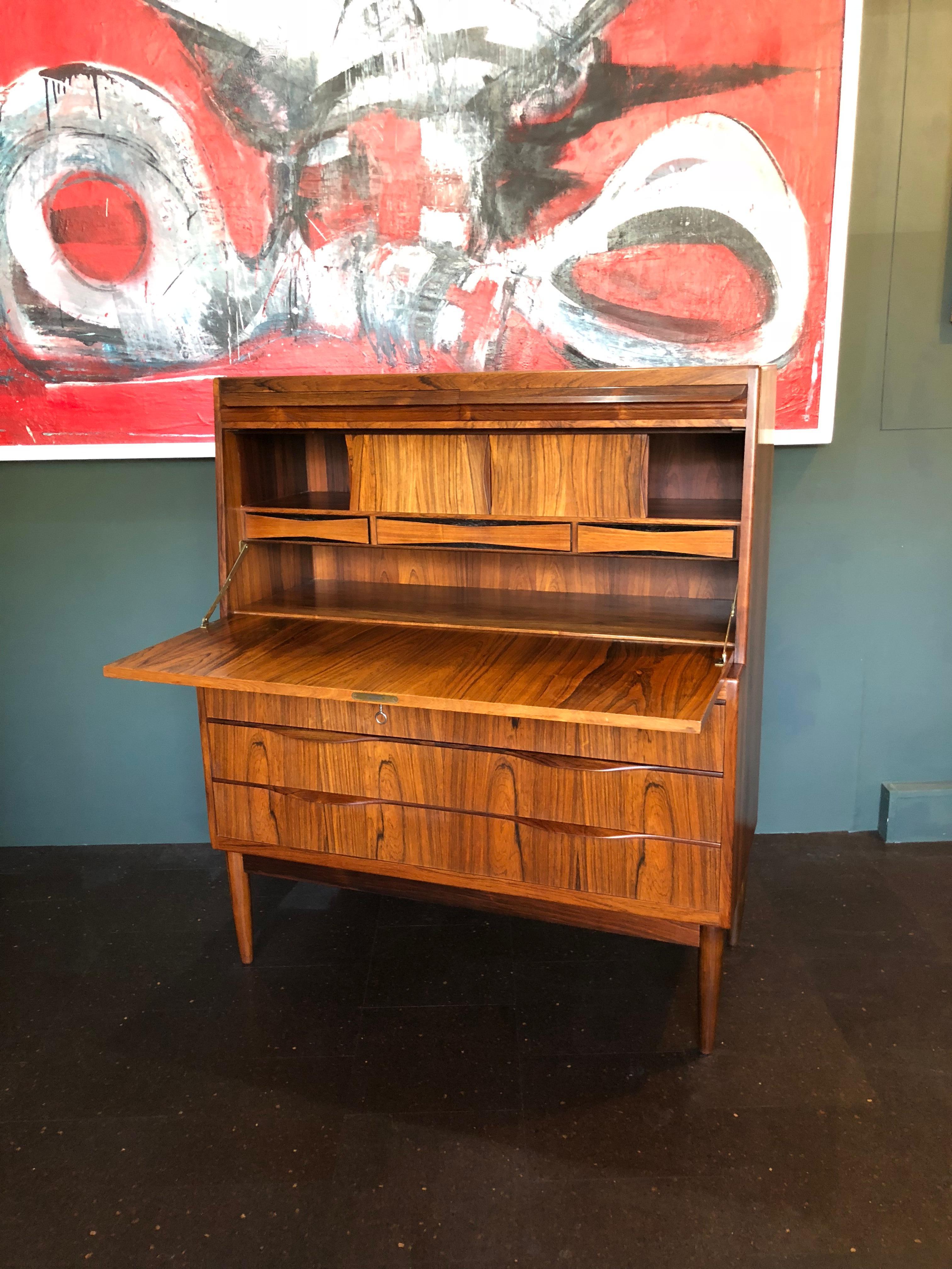 Superb rosewood Danish midcentury secretaire - Bureau. Designed by Erling Torvits. Wonderful rosewood and in very good condition throughout. Produced by respected manufacturers Klim Mobler. Completely cleaned and surface polished. Practical