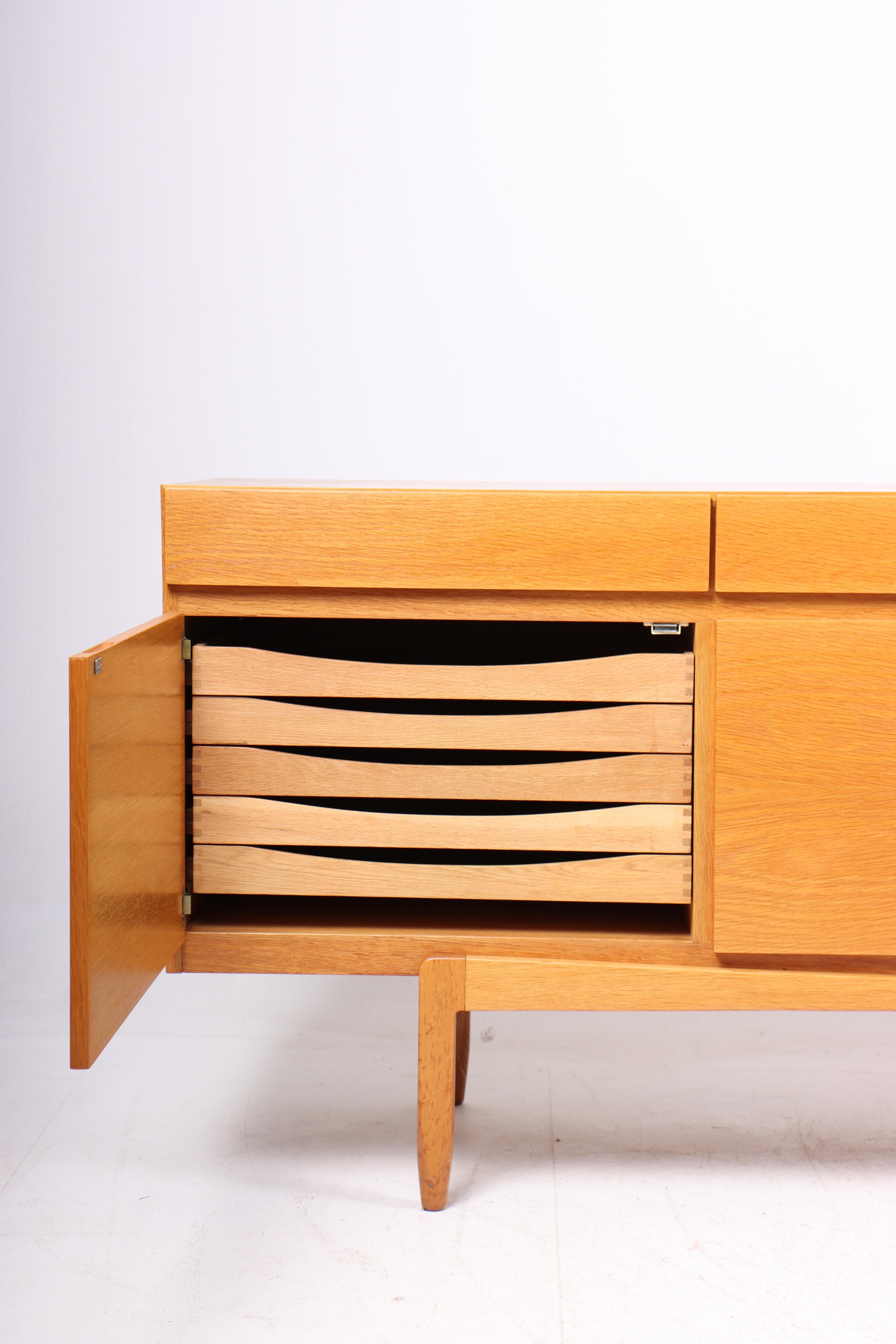 Scandinavian Modern Danish Midcentury Sideboard in Oak Designed by Ib Kofod-Larsen, 1960s For Sale