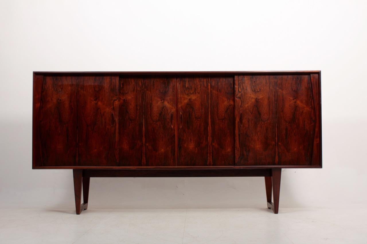 Great looking sideboard in rosewood designed and made in Denmark in 1960s. Great original condition.