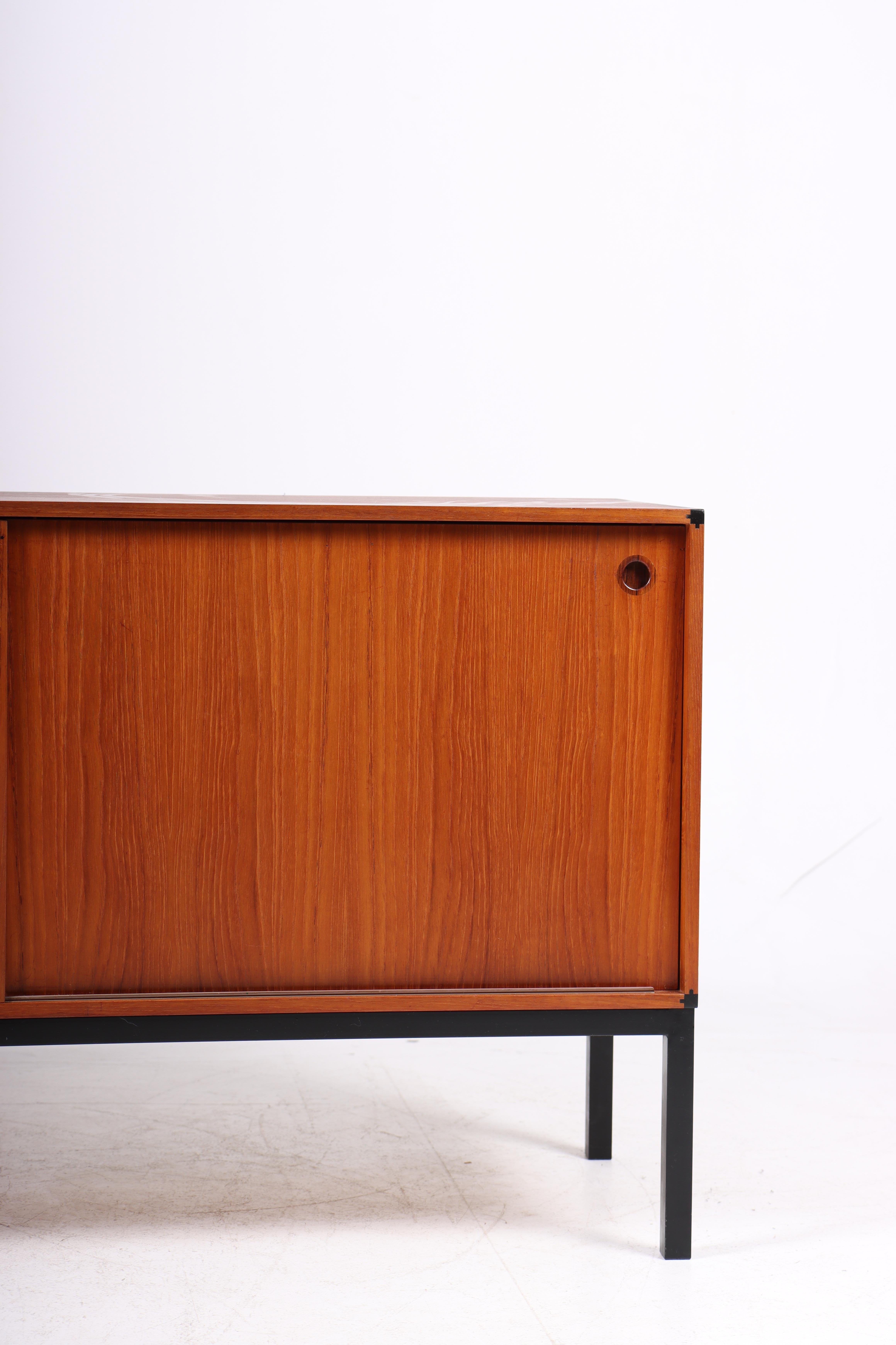 Great looking sideboard in teak, designed and made in Denmark in 1960s. Great original condition.