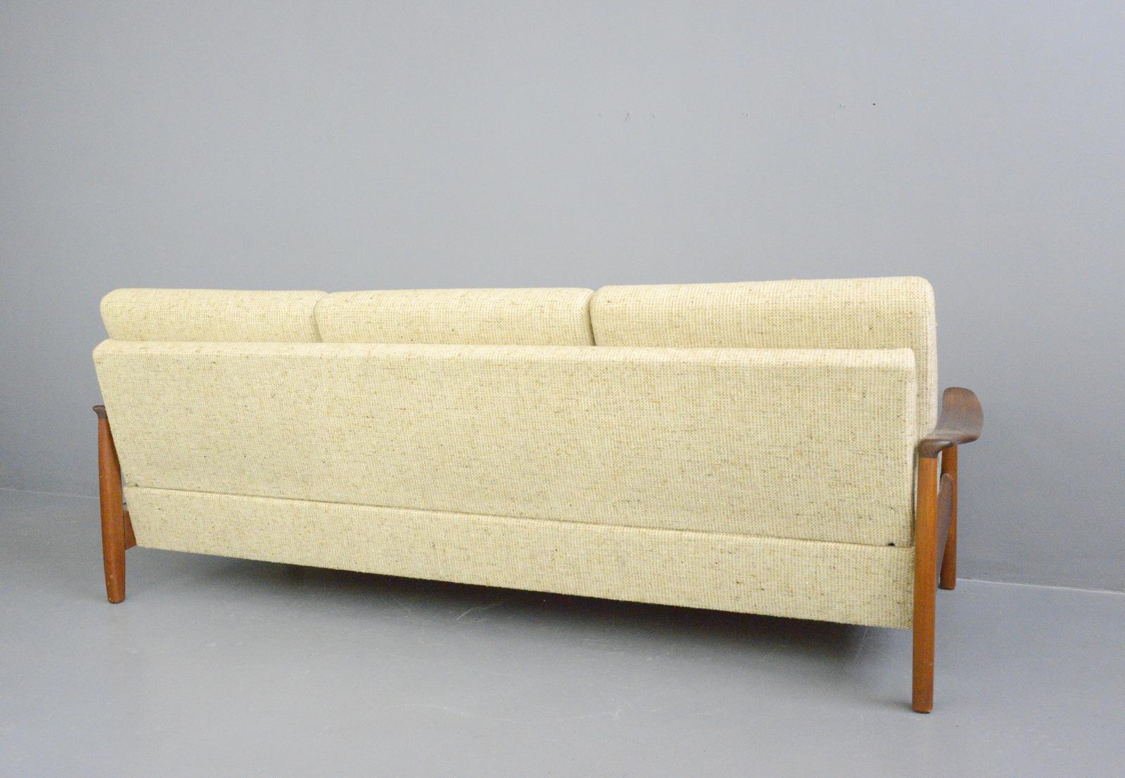 Danish midcentury sofa, circa 1960s

- Original upholstery
- Teak frame
- Folds into a daybed
- Danish, 1960s
- Measures: 208cm wide x 83cm deep x 80cm tall
- 42cm seat height

Condition report:

Very minimal cosmetic wear.