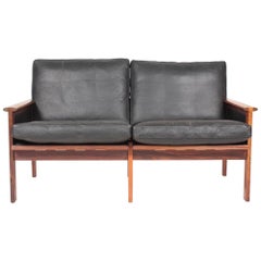 Danish Midcentury Sofa in Leather and Rosewood by Illum Wikkelsø