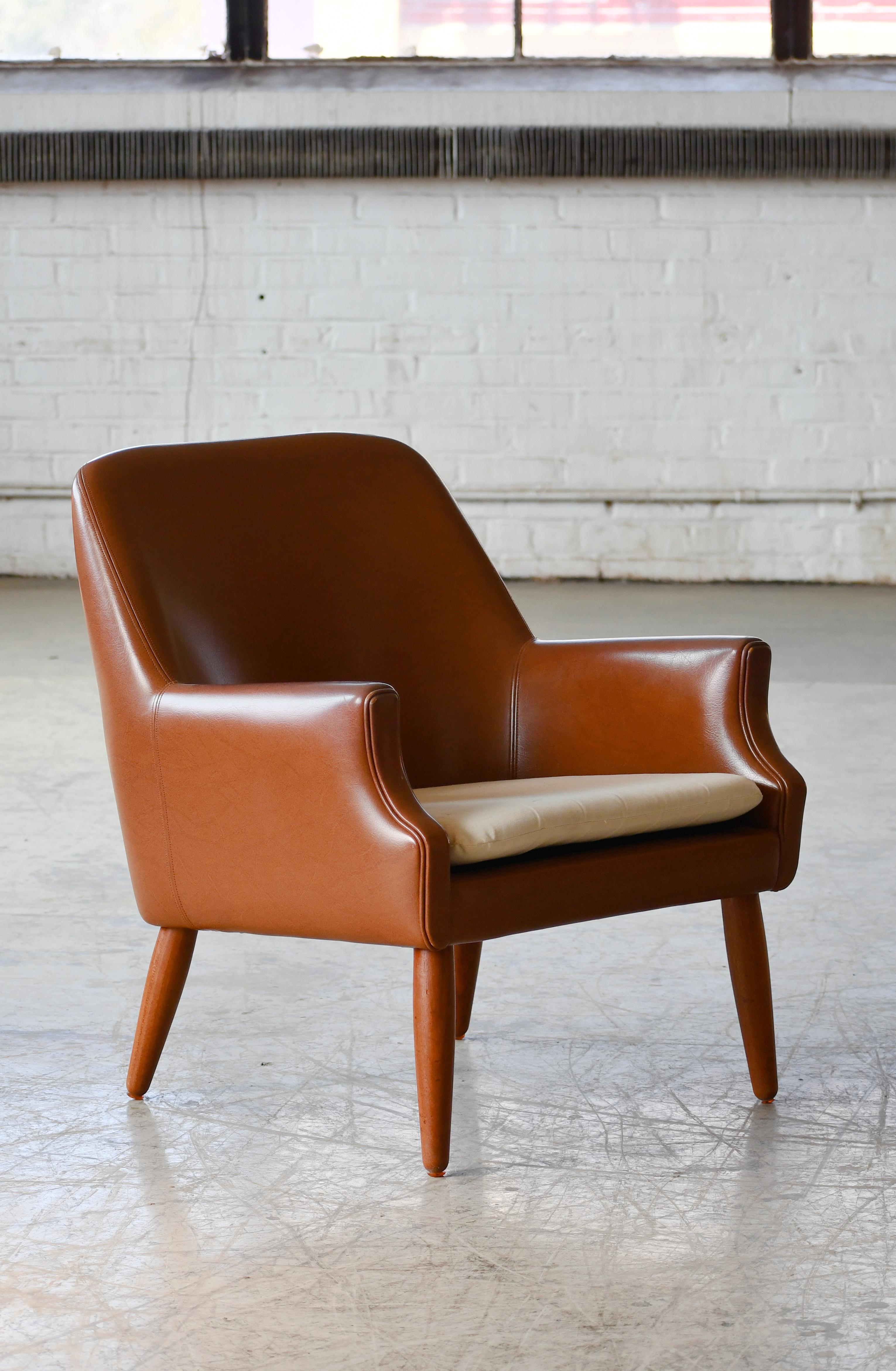 Scandinavian Modern Danish Midcentury Space Age Lounge Chair in Teak and Naugahyde For Sale