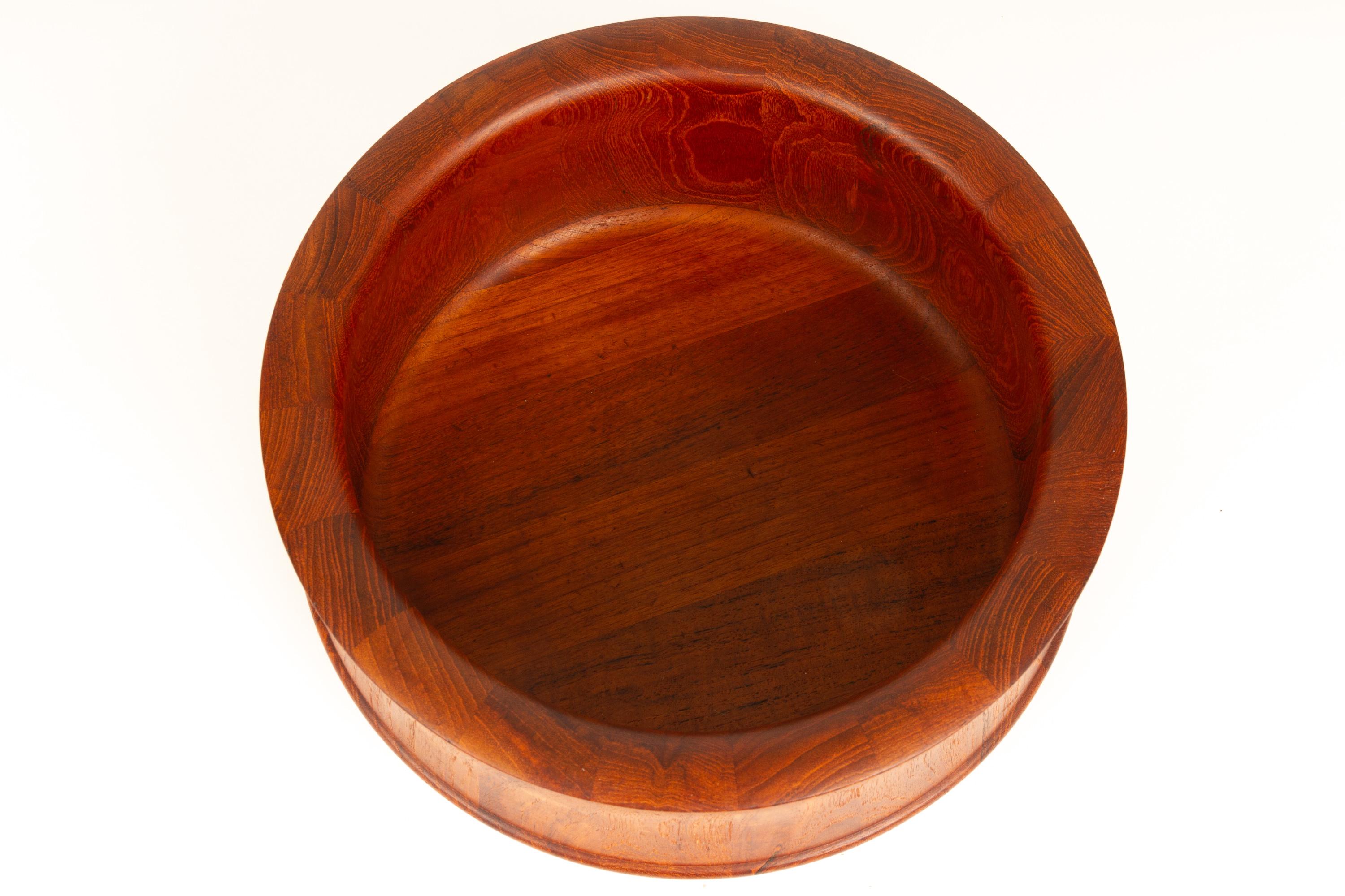 Danish midcentury teak bowl by Nissen, 1960s.
Large round bowl in solid staved teak made by Danish manufacturer Richard Nissen in Denmark. Beautiful shape and patina.