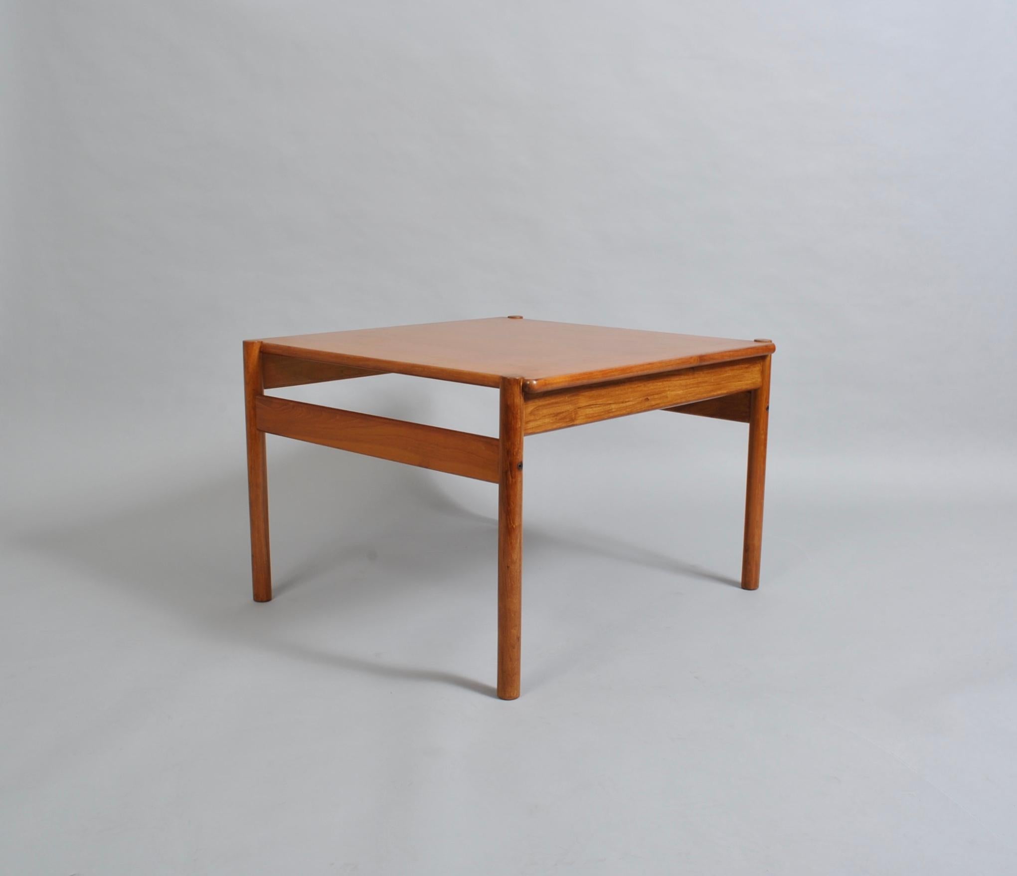 A square Danish teak midcentury coffee table. Produced, circa 1960. 
legs easily removed/assembled for safe transit.