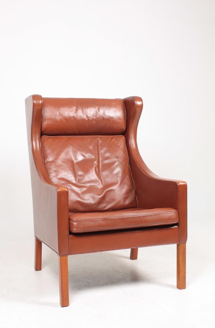Scandinavian Modern Danish Midcentury Wing Back Chair in Patinated Leather by Børge Mogensen For Sale