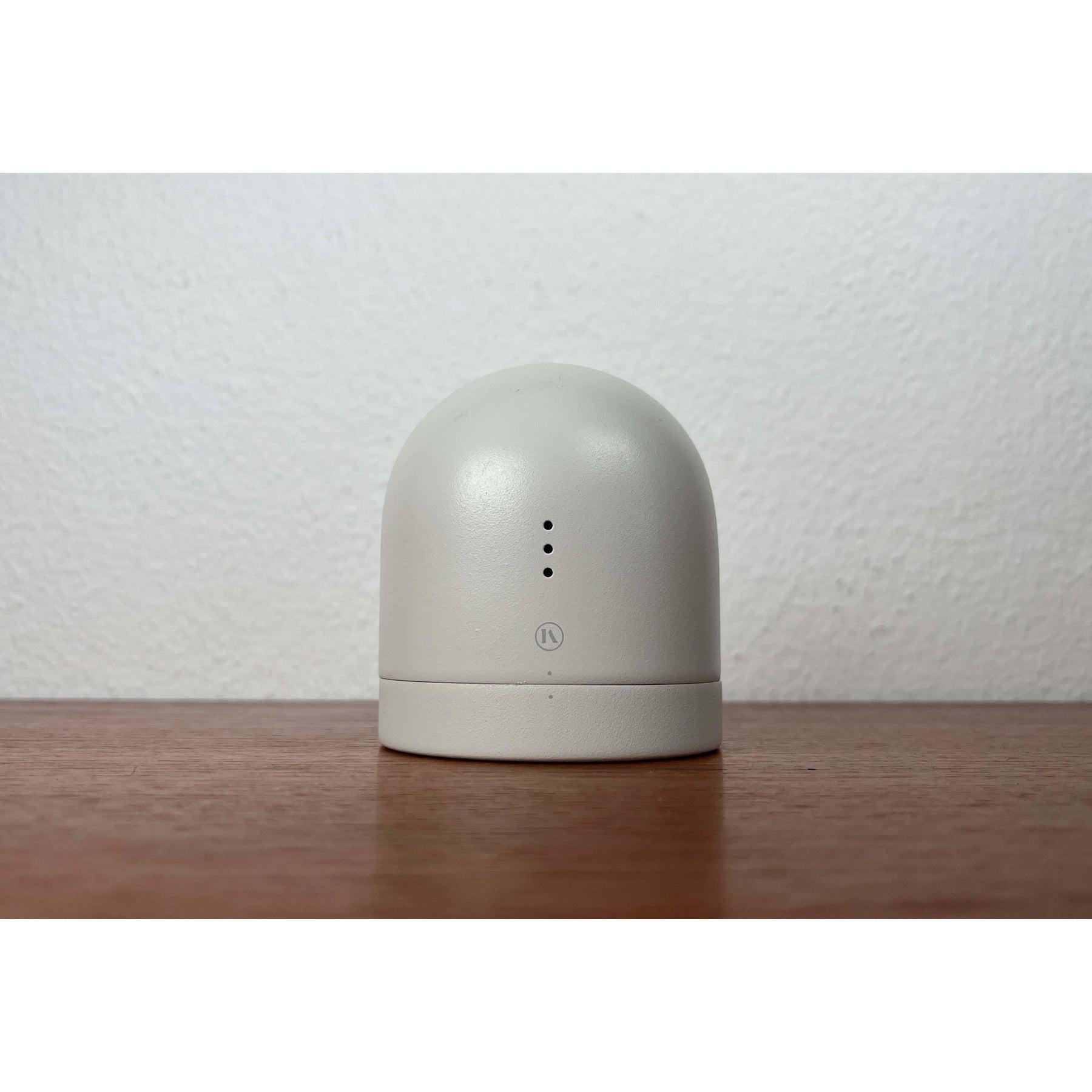 Minimalist alarm clock. To turn off the alarm, simply turn it upside down. This piece has an attribution mark.

Additional information:
Materials: Metal, Plastic
Color: Gray
Style: Minimalist
Country of Origin: Germany
Item Type: Vintage, Antique or