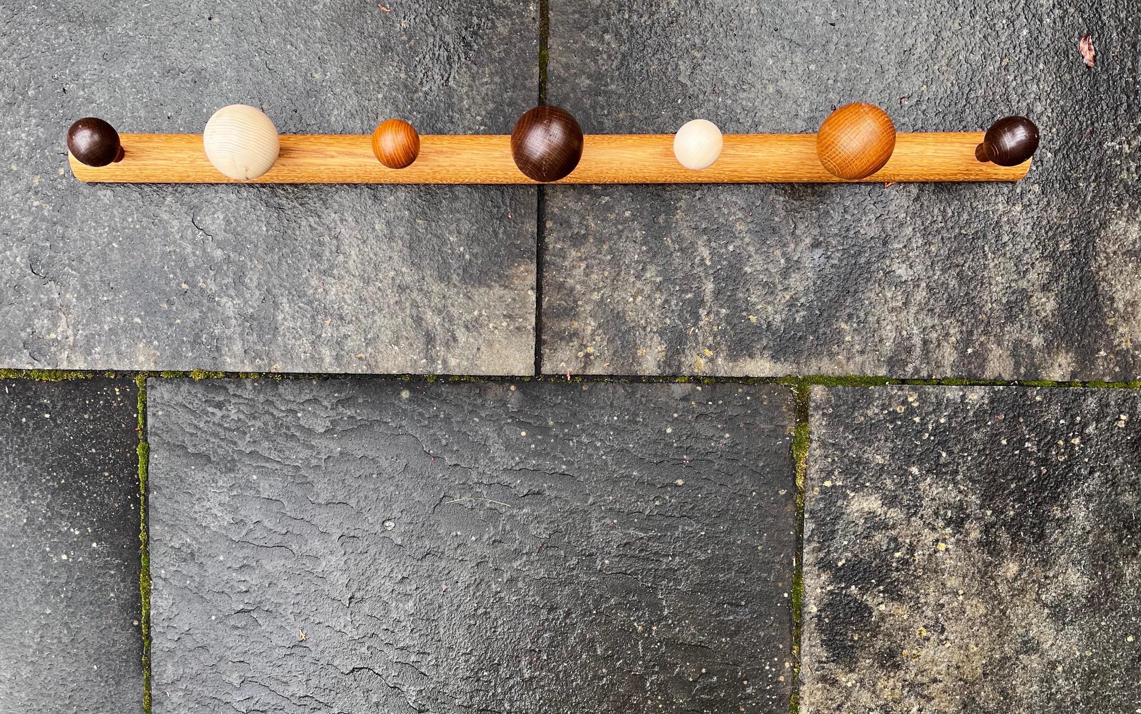 Danish Mixed Wood Wall Coat Rack By Romers In Good Condition For Sale In Philadelphia, PA