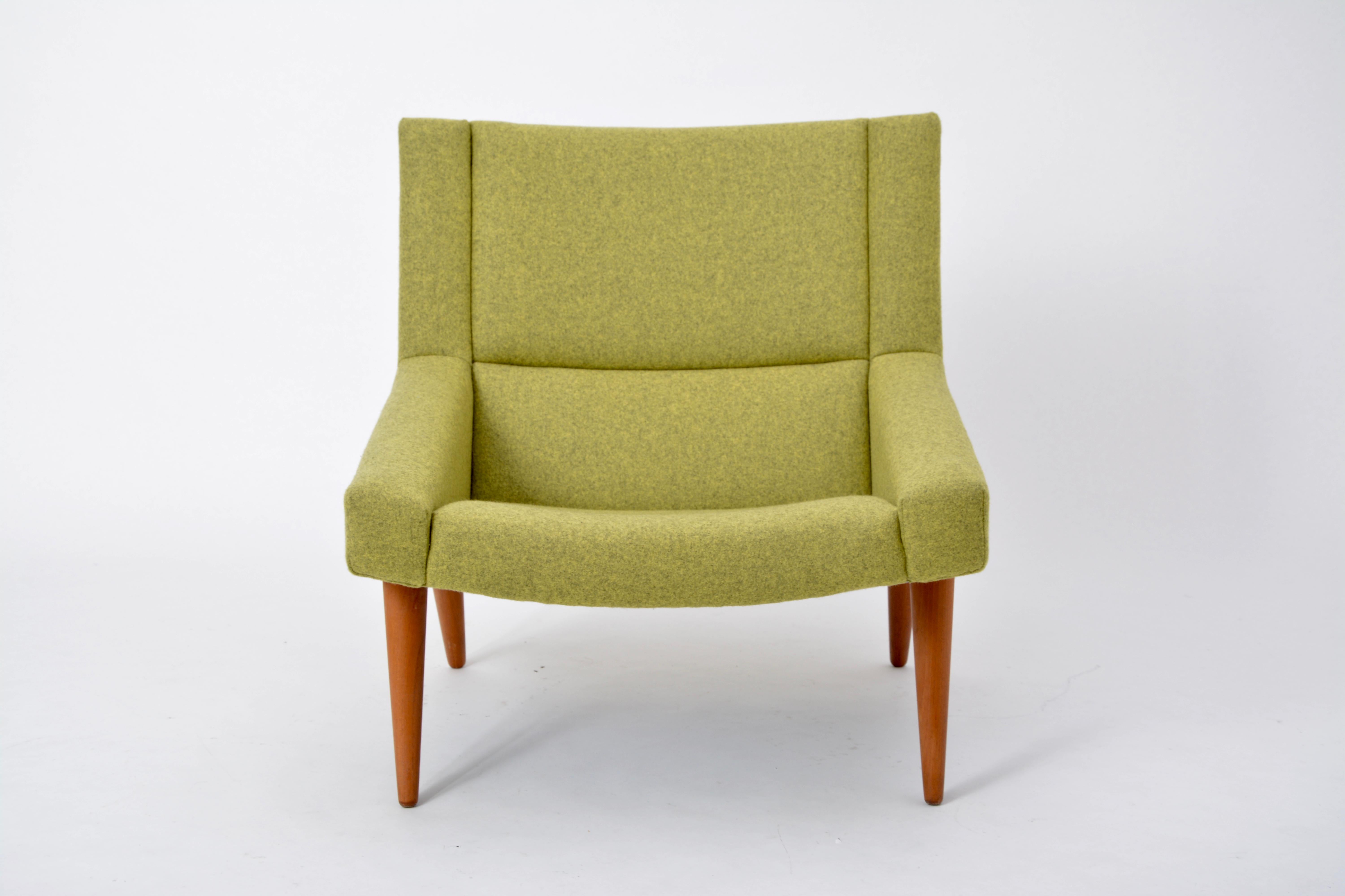 Danish Mid-Century Modern Model 50 chair by Illum Wikkelsø for Søren Willadsen

This model 50 lounge chair was designed by Illum Wikkelsø and was produced by Søren Willadsen in Denmark in the 1960s. The chair has been reupholstered with a green