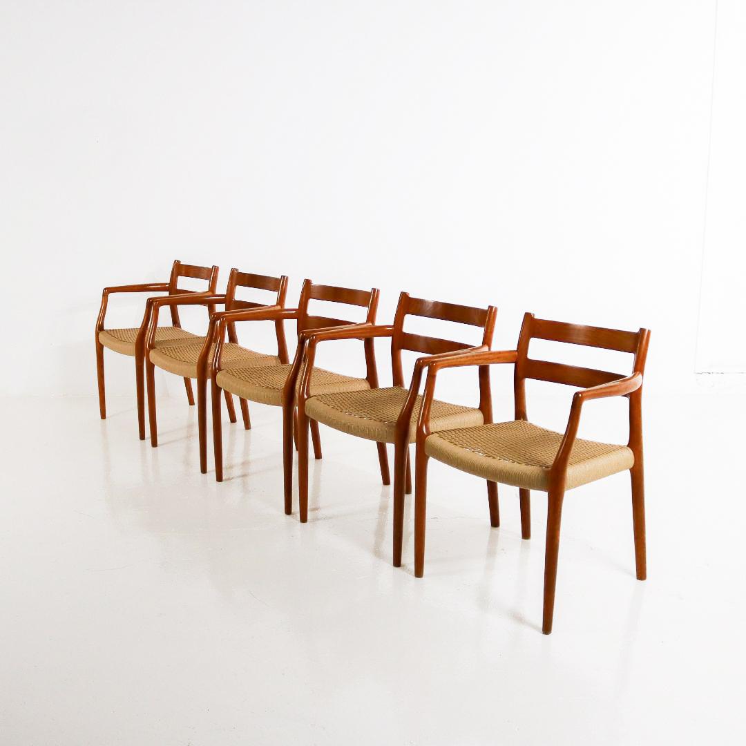Beautiful dining chair 'Model 67' by the Danish designer Niels Möller. The 1960s design features a solid teak frame and a new paper cord seat. The Danish Design chair is in good condition with some light signs of use (patina) on the frame. There are