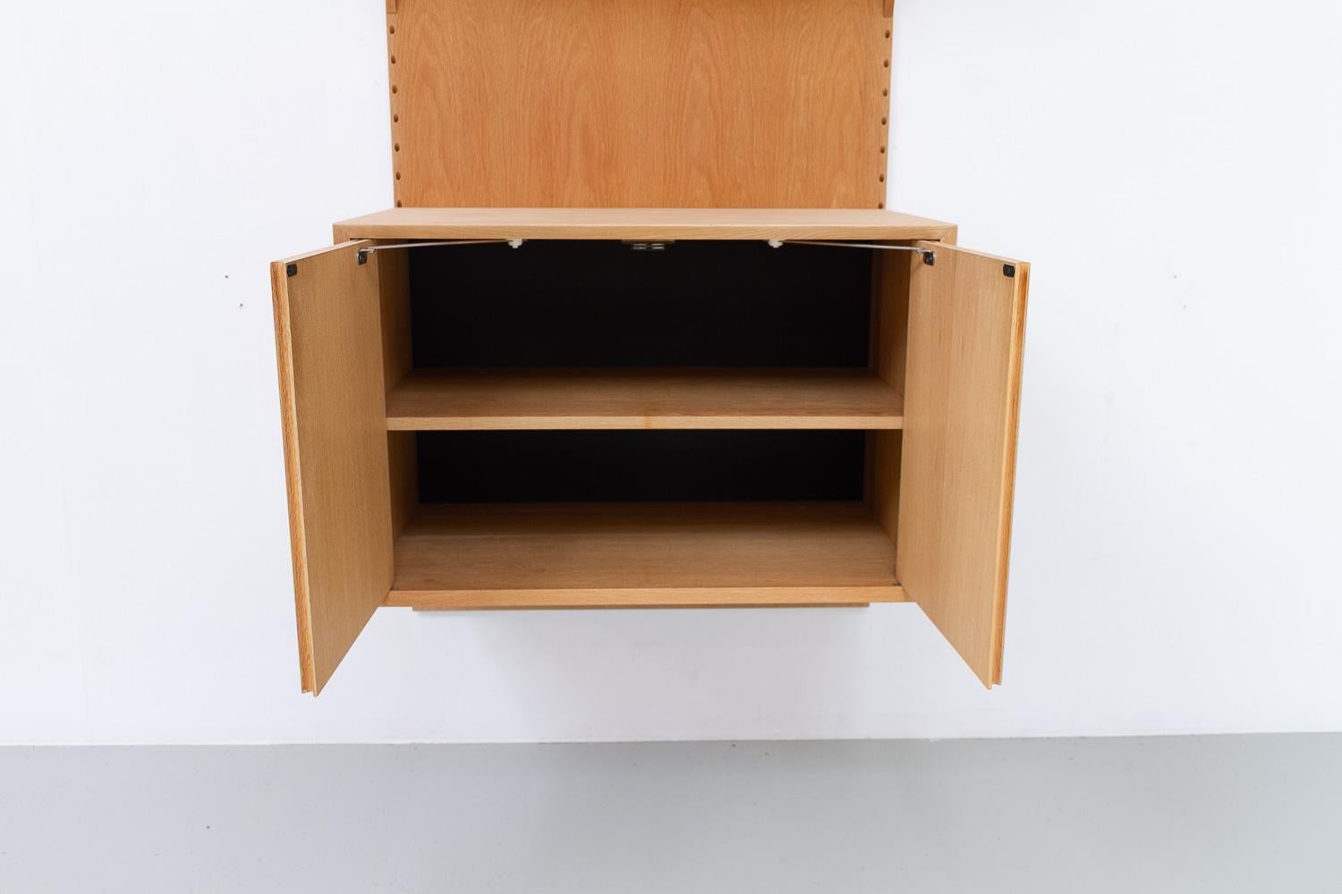 Parete attrezzata moderna danese a 1 campata modulare in Oak di Poul Cadovius per Cado 1960. In condizioni buone in vendita a Asaa, DK