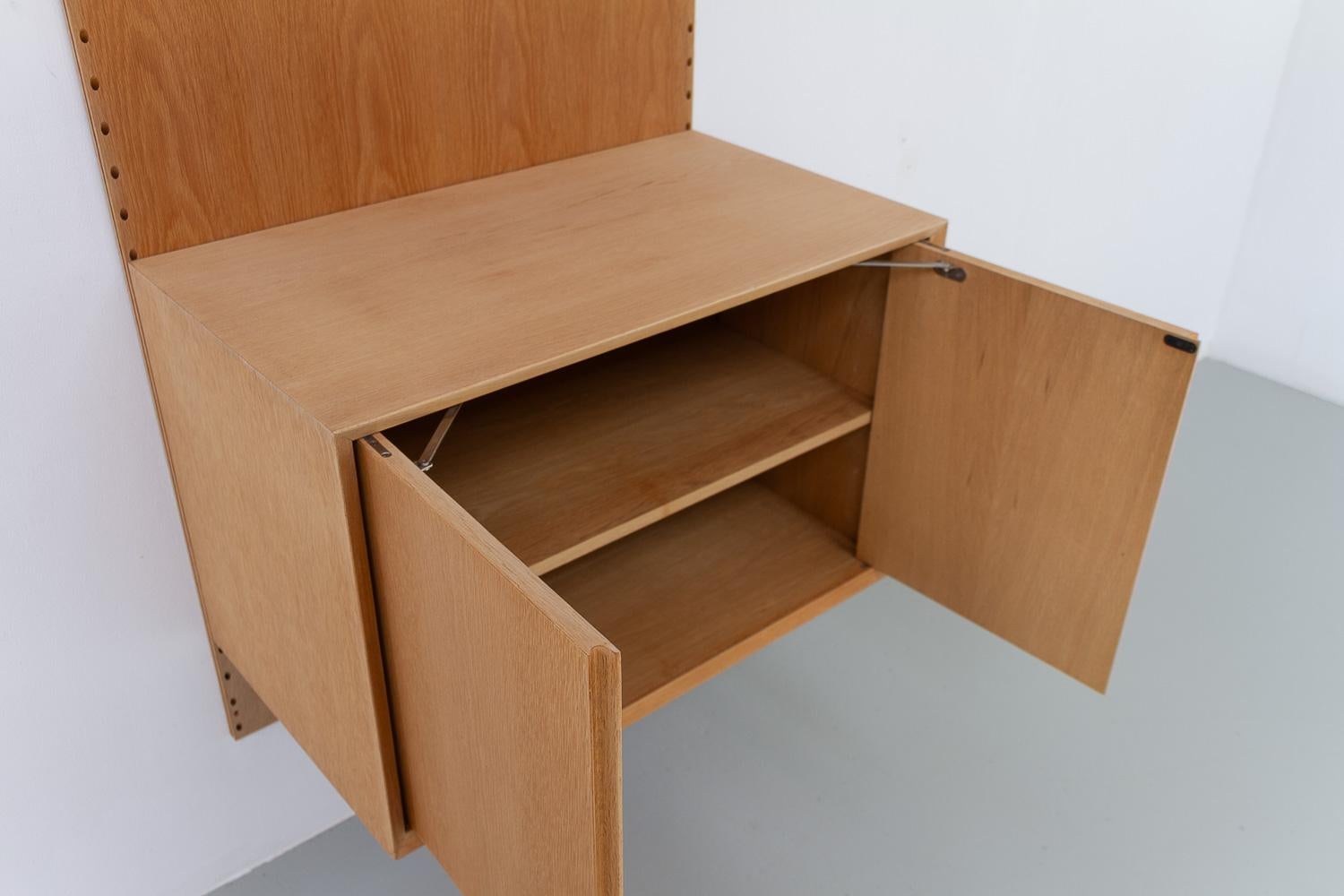 Metà XX secolo Parete attrezzata moderna danese a 1 campata modulare in Oak di Poul Cadovius per Cado 1960. in vendita