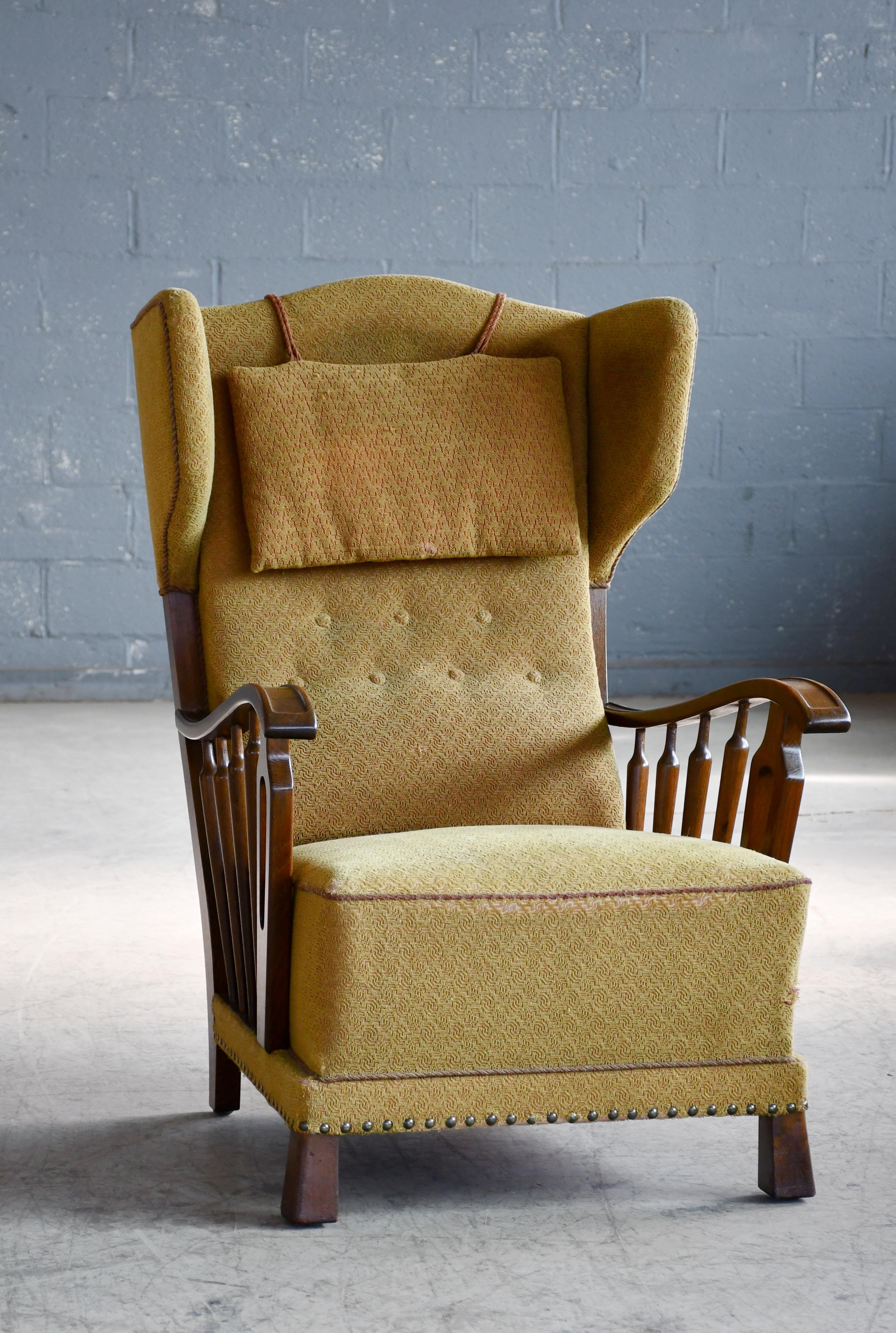 Mid-Century Modern Danish Modern 1950s Highback Lounge Wing Chair With Wooden Armrests For Sale