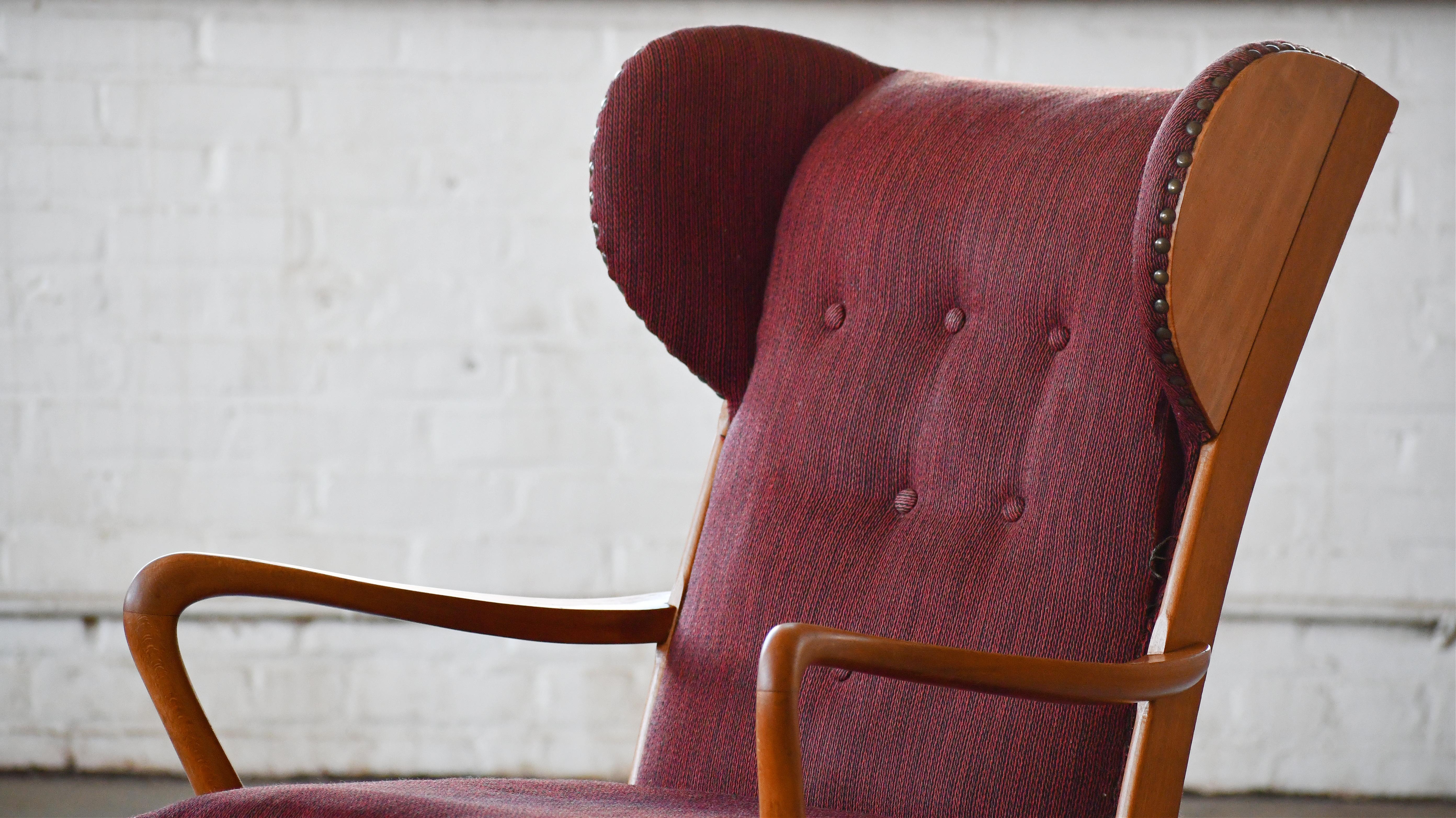 Mid-20th Century Danish Modern 1950s Highback Lounge Wing Chair With Wooden Wings For Sale
