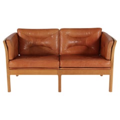 Danish Modern 2-seater Sofa of Oak with Cognac Colored Leather Cushions + Strips