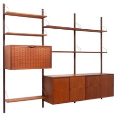 Danish Modern 3-Bay Modular Teak Wall Unit by Poul Cadovius for Cado, 1960s.