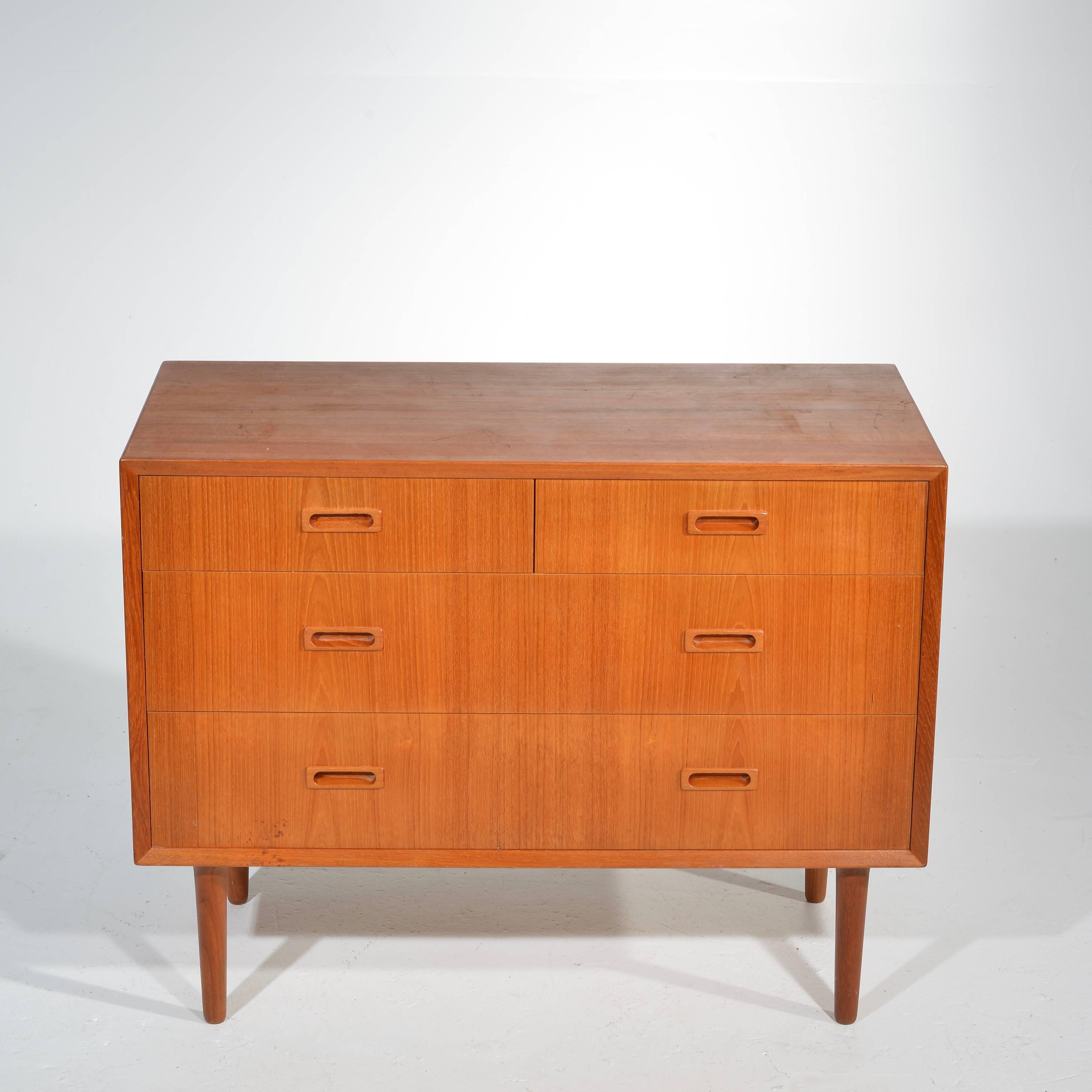 This Danish modern teak four-drawer cabinet is perfect to pair with our Pedersen & Hansen mirror to create a very stylish vanity.