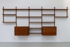 Danish Modern 5-Bay Modular Walnut Wall Unit by Poul Cadovius for Cado, 1960s.