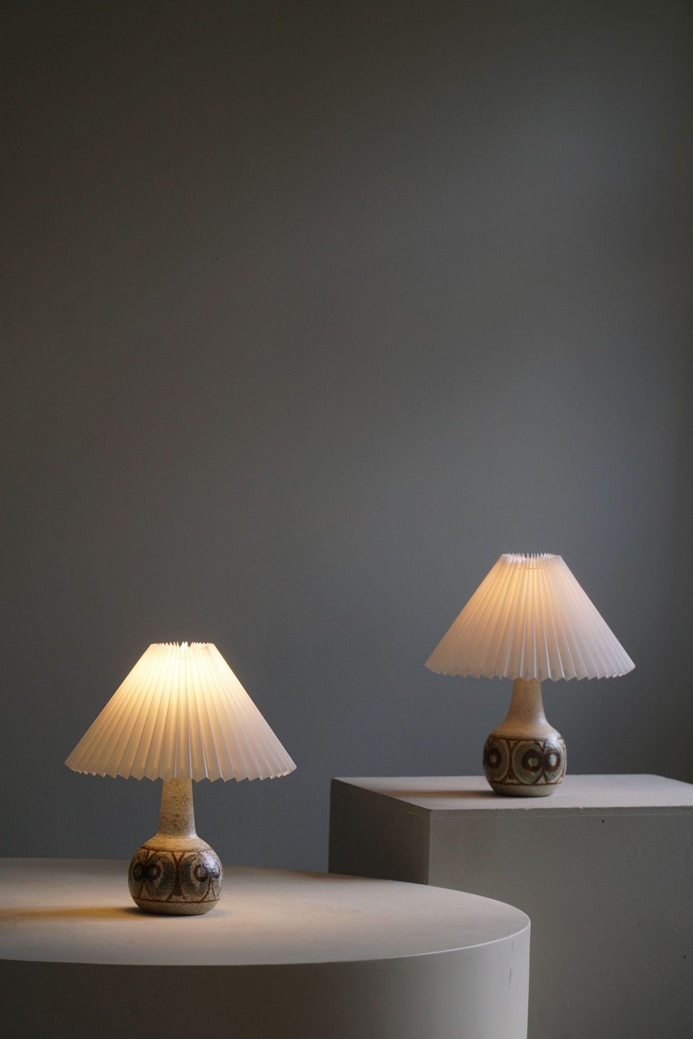 A beautiful pair of organic shaped stoneware table lamps. Made by Søholm in Denmark, in the 1970s.
Both table lamps are in great condition. A beautiful set well suited for the Modern interior or Scandinavian lifestyle.

NB: Sold without the lamp