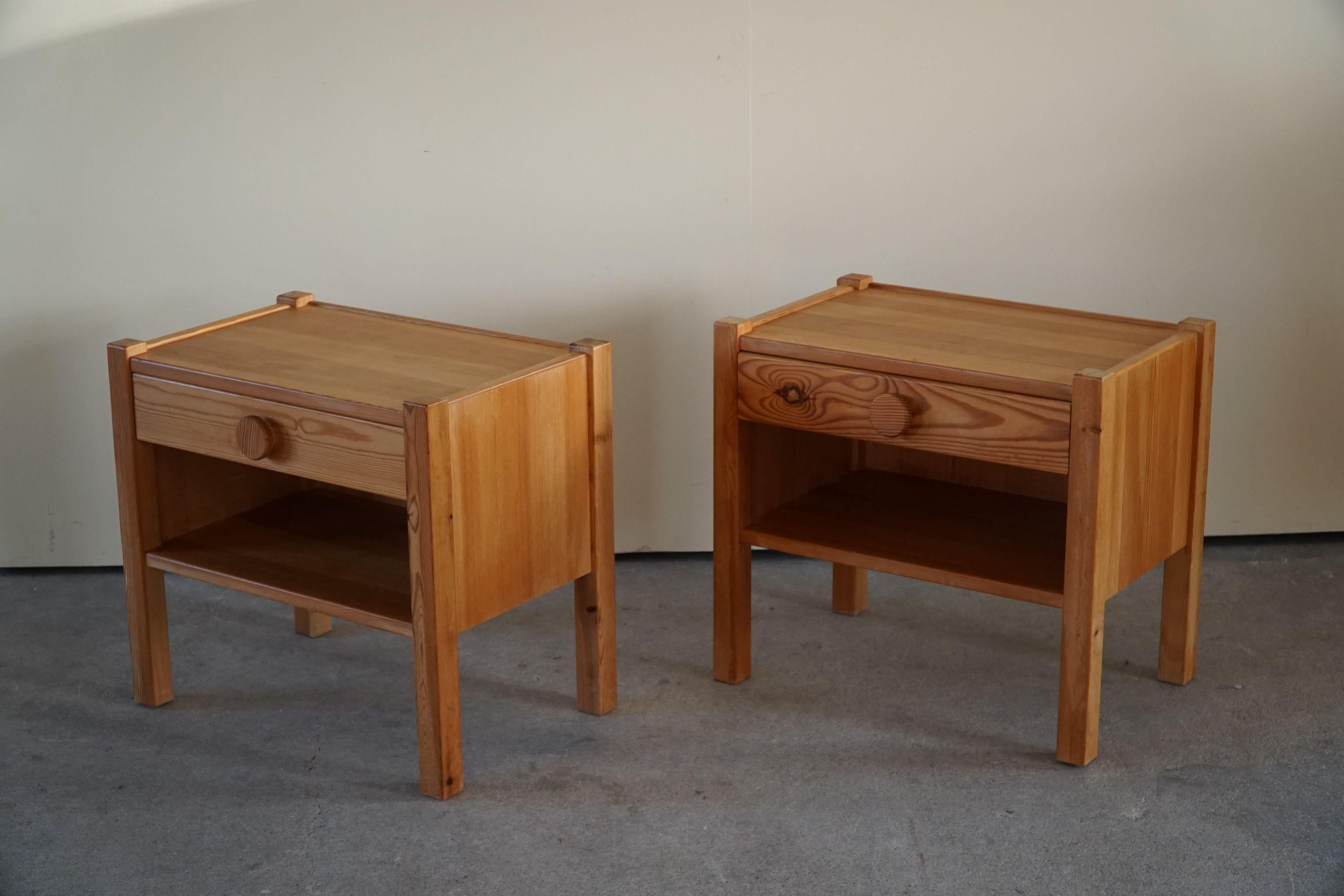 Pair of Scandinavian brutalist bedroom sets in solid pine, made in Denmark, 1970s.

The night stands are nicely patinated and in a good vintage condition. Both night stands with a drawer.