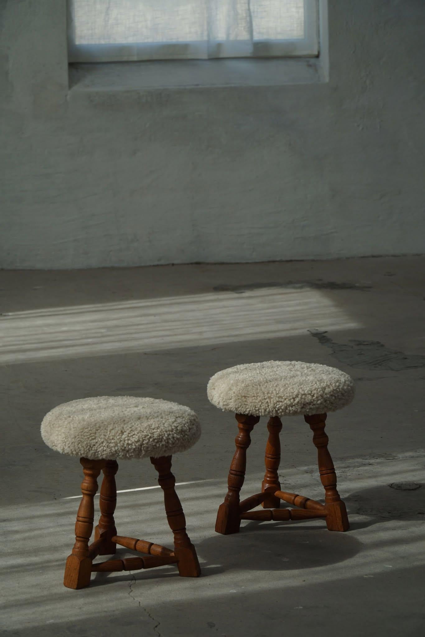 Danish Modern, A Pair of Oak Tripod Stools, Seats in Shearling Lambswool, 1950s For Sale 3