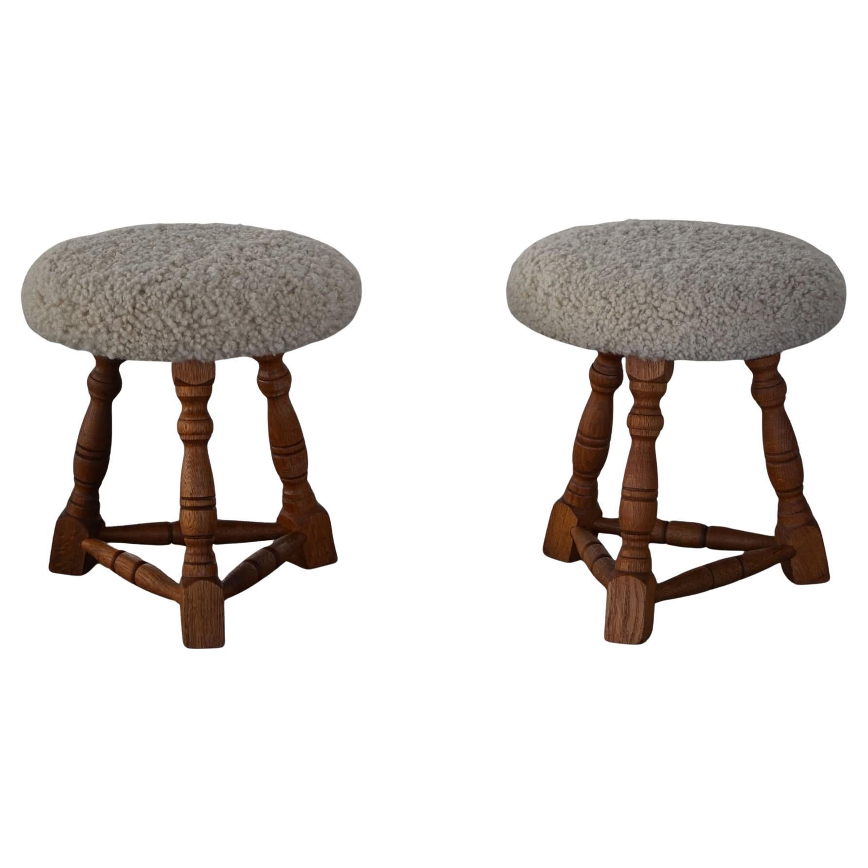 Danish Modern, A Pair of Oak Tripod Stools, Seats in Shearling Lambswool, 1950s
